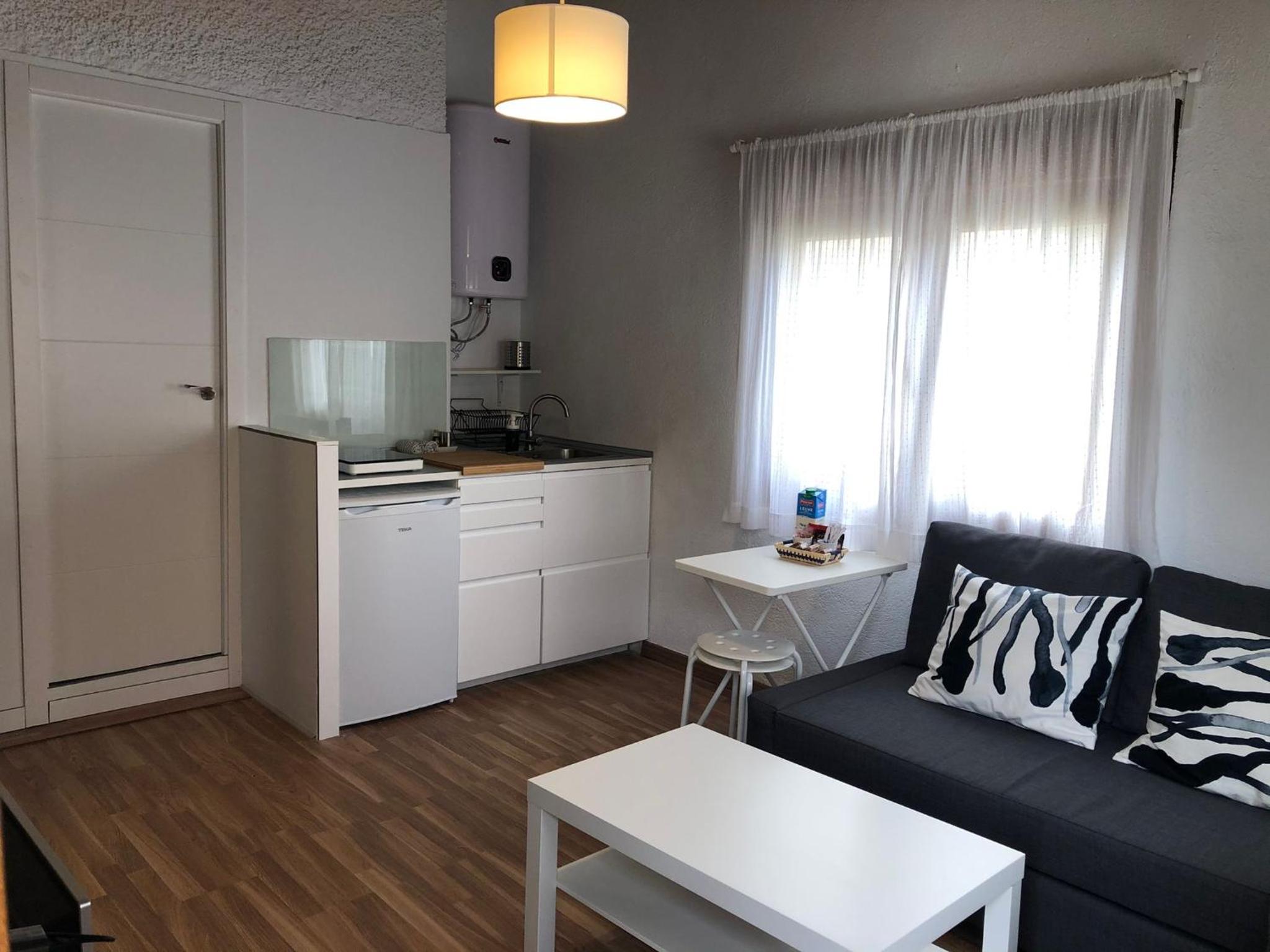 Estudio con sofá cama