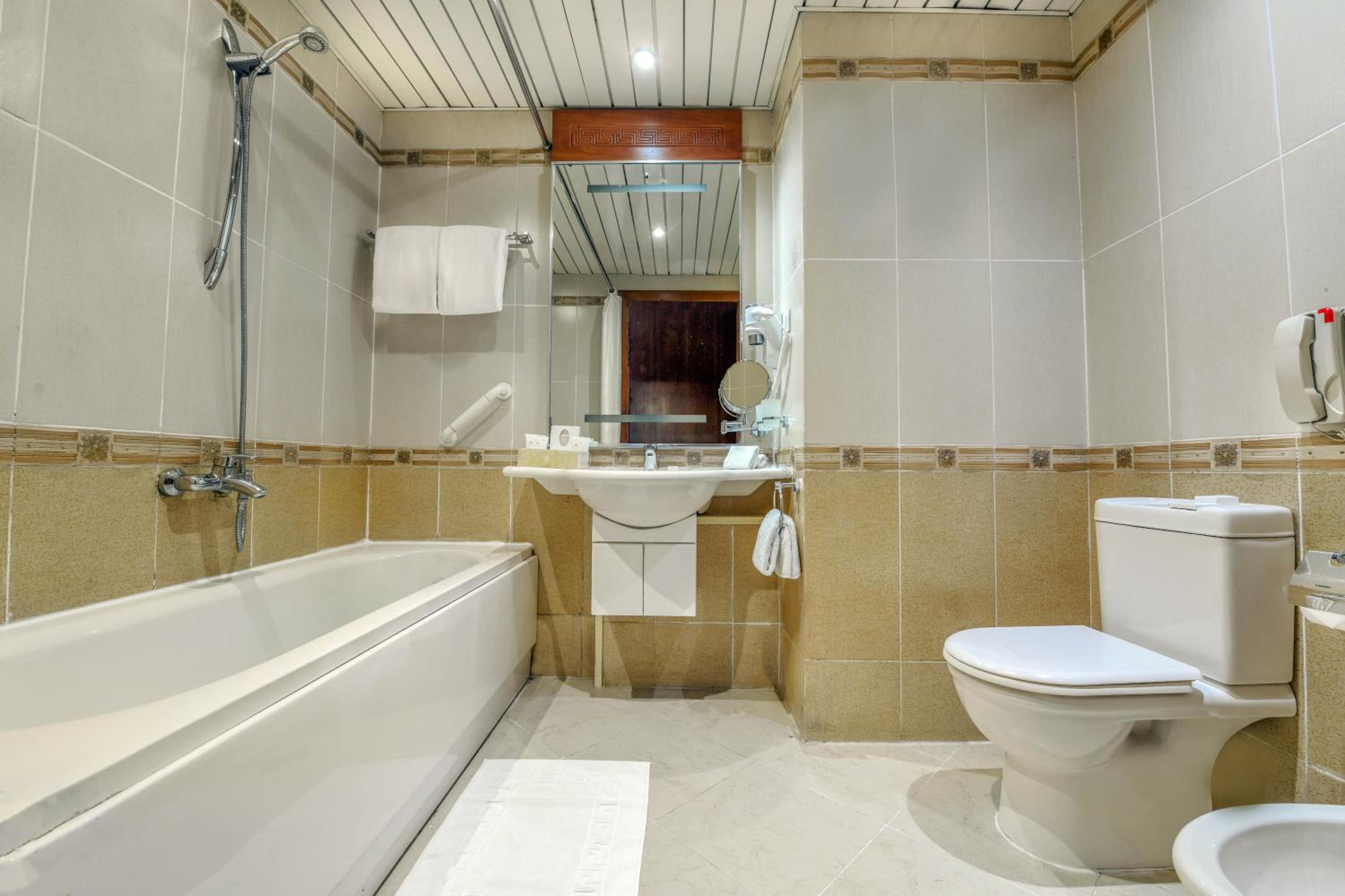Two-Bedroom Suite with Sea and Pool View