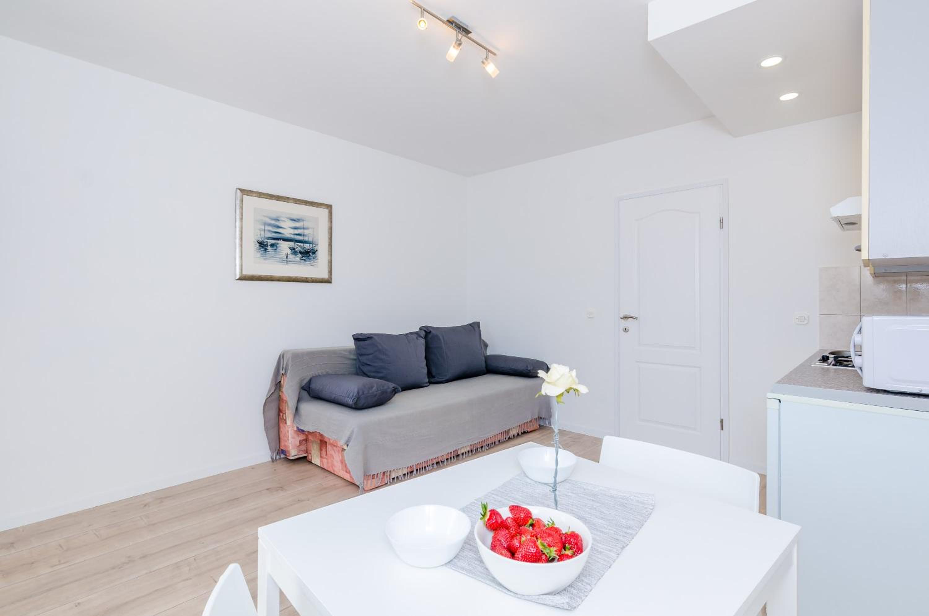 Comfort One-Bedroom Apartment with Terrace and Partial Sea View