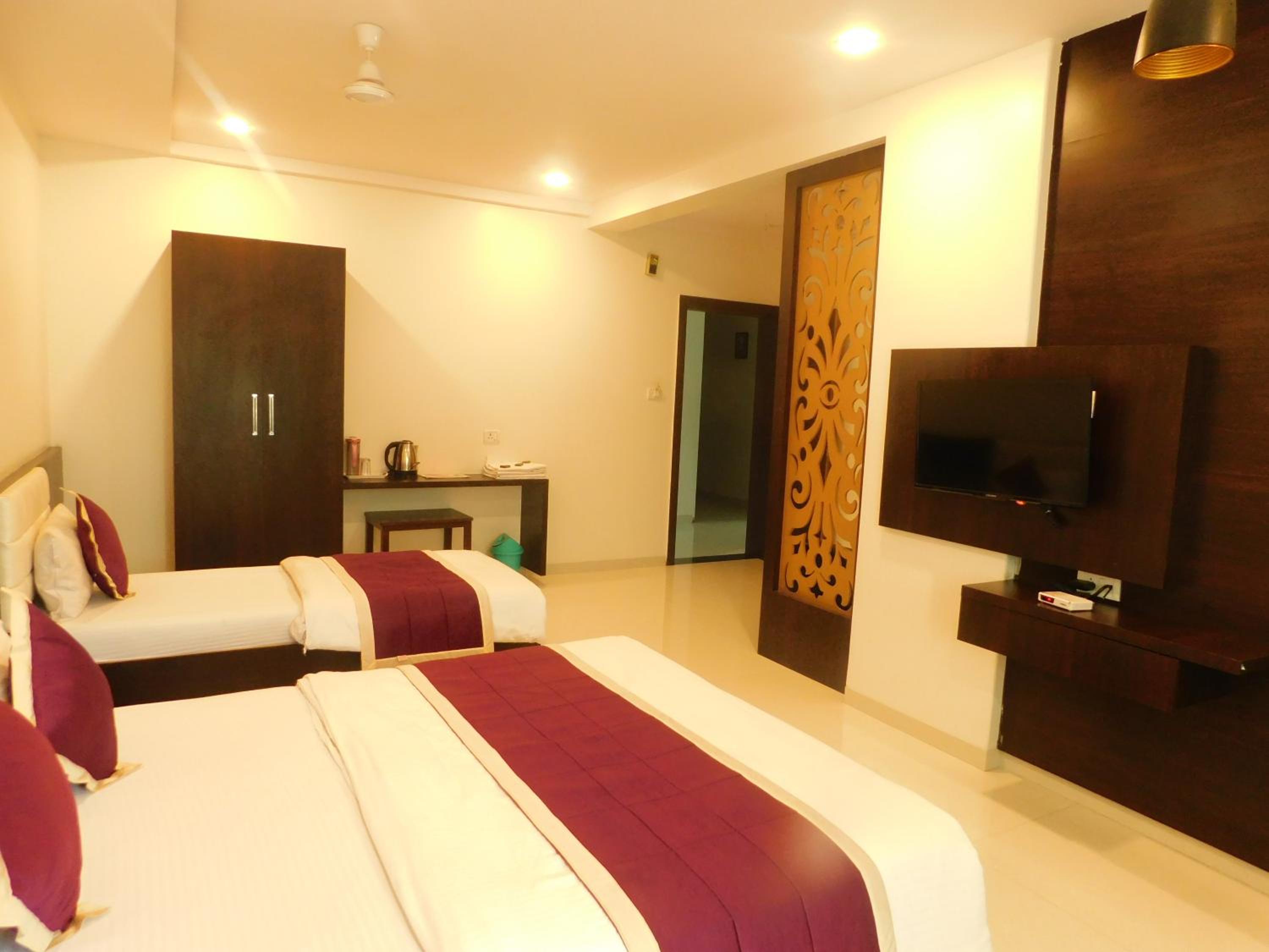 Deluxe Triple Room - Photo 17