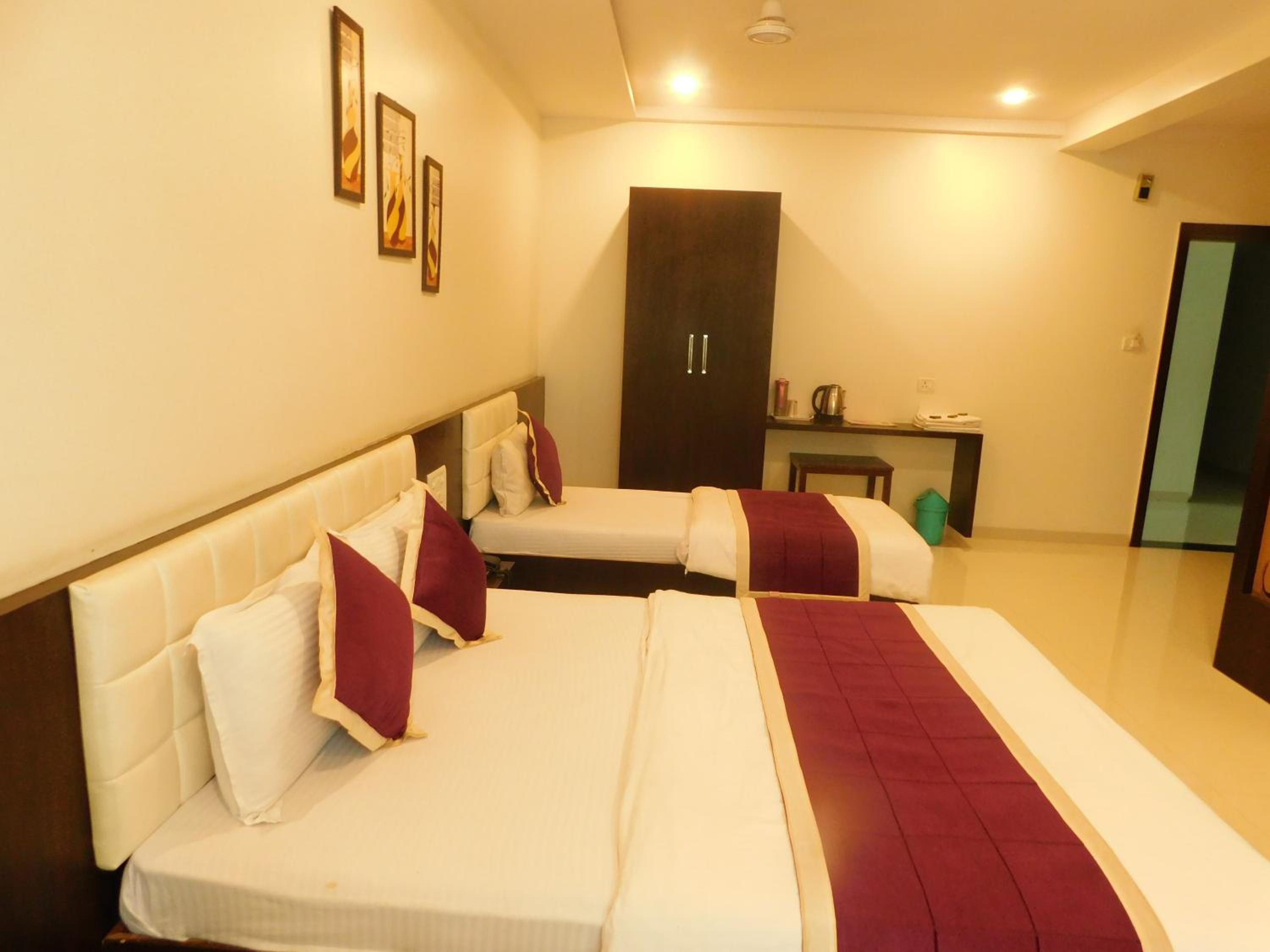 Deluxe Triple Room - Photo 15