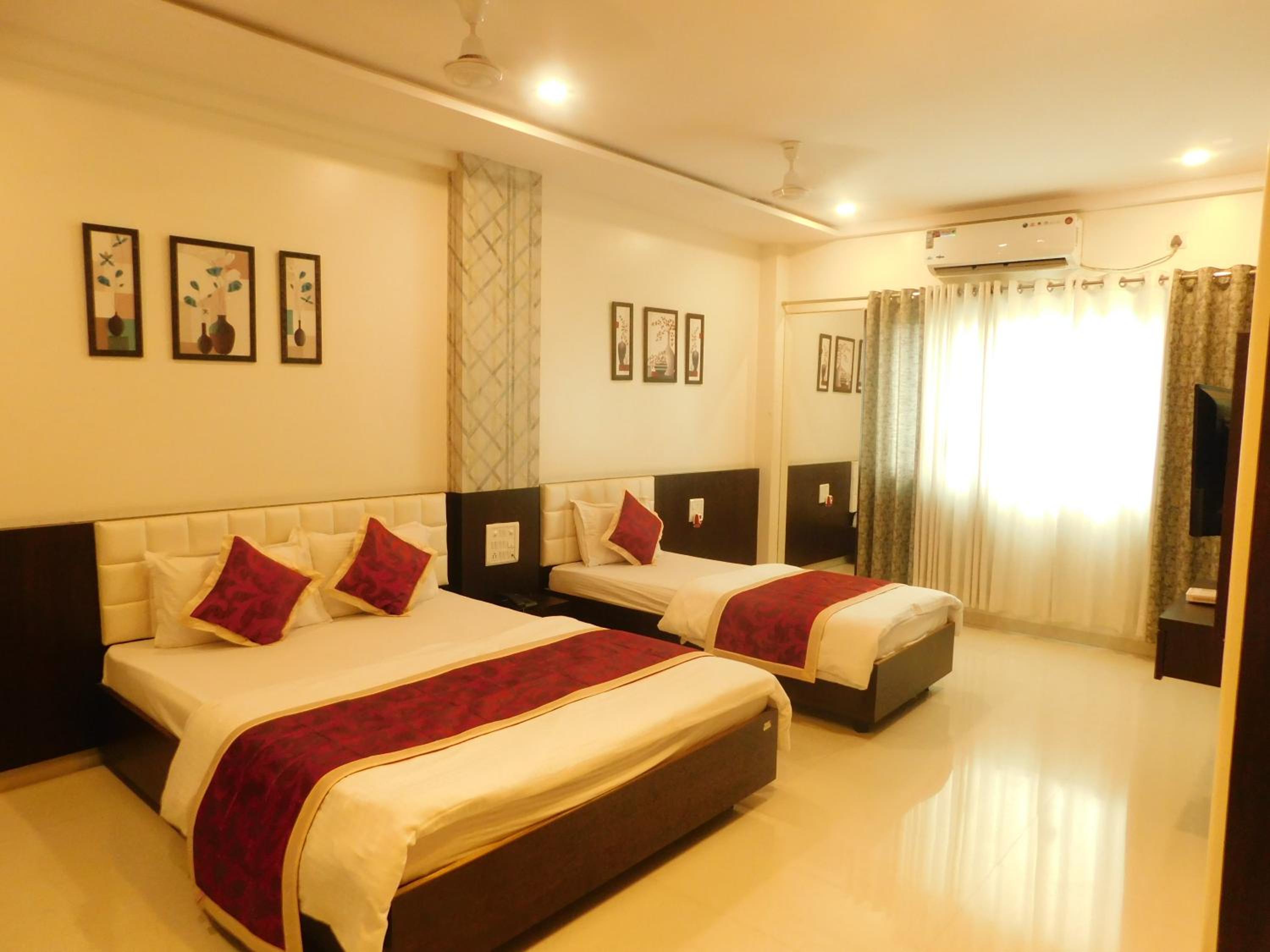 Deluxe Triple Room - Photo 13