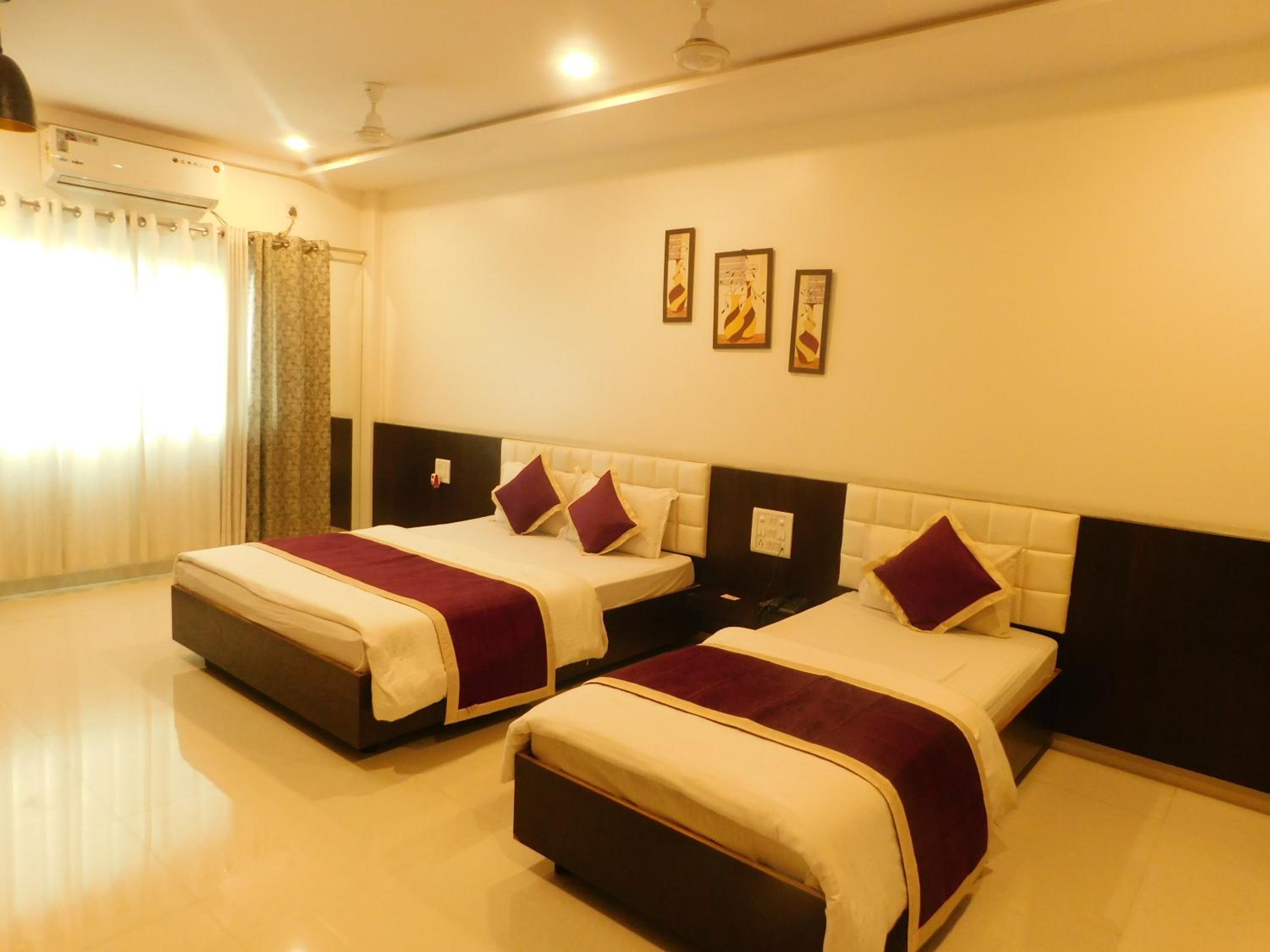 Deluxe Triple Room - Photo 8