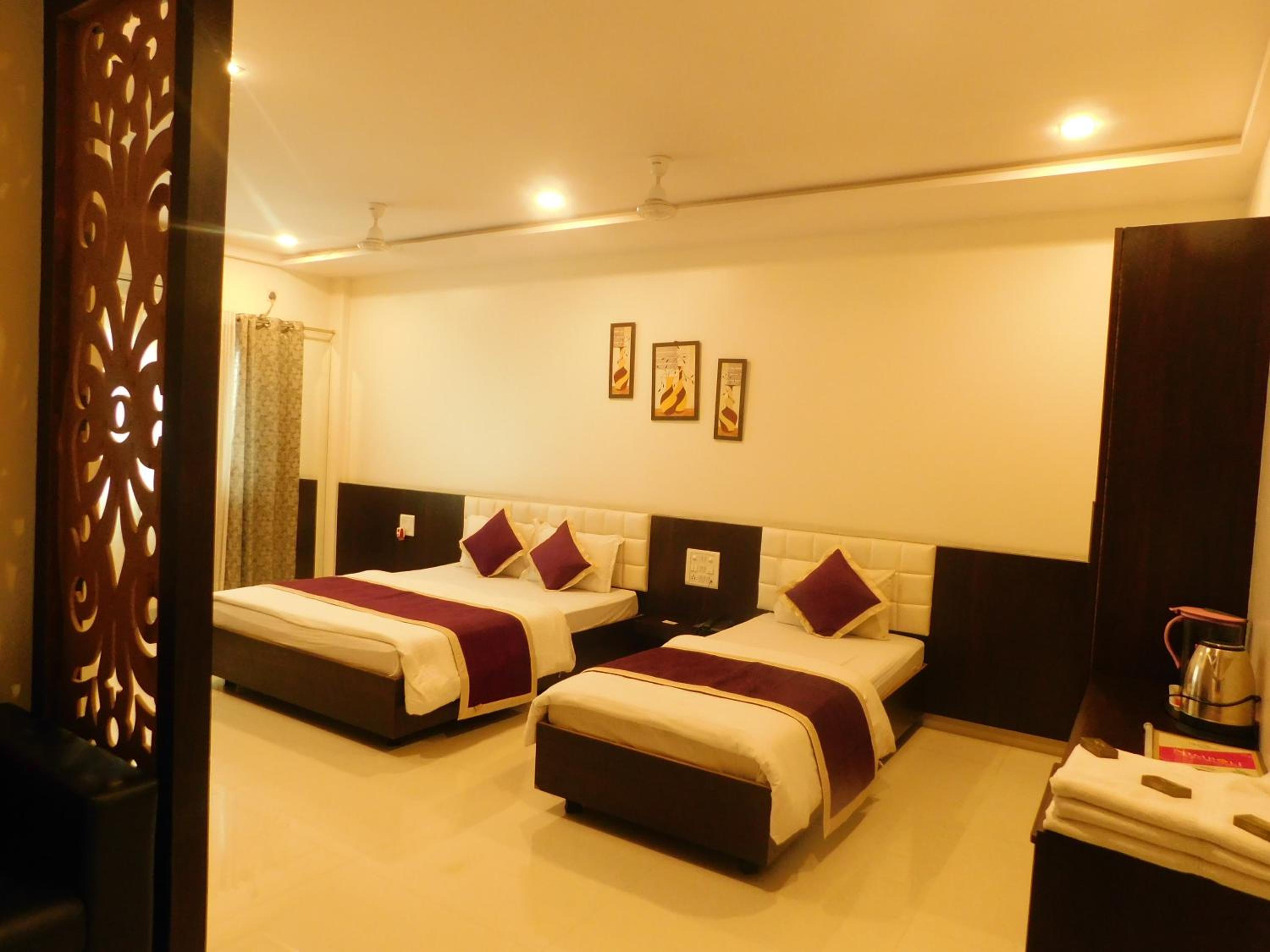Deluxe Triple Room - Photo 10