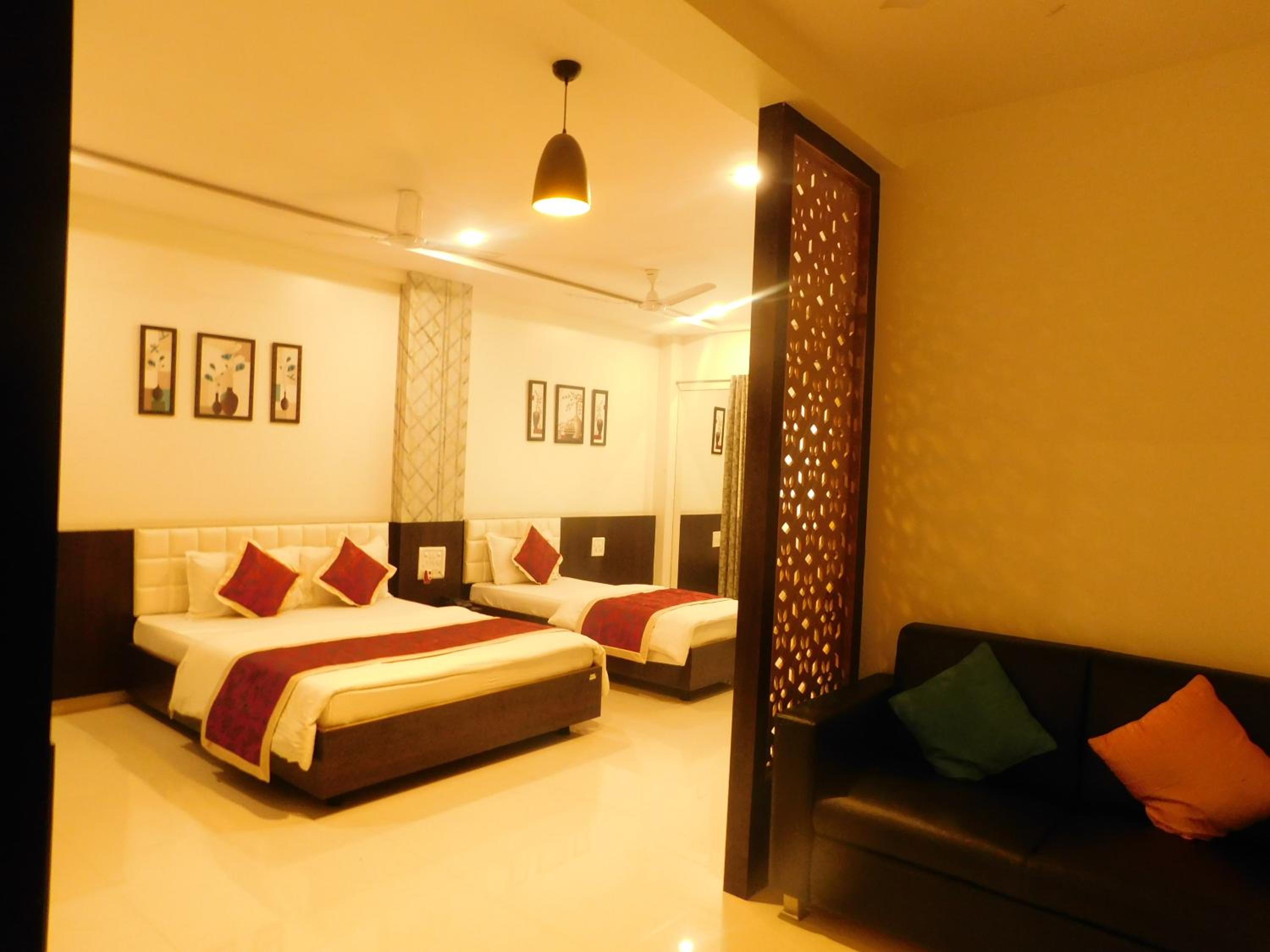 Deluxe Triple Room - Photo 9