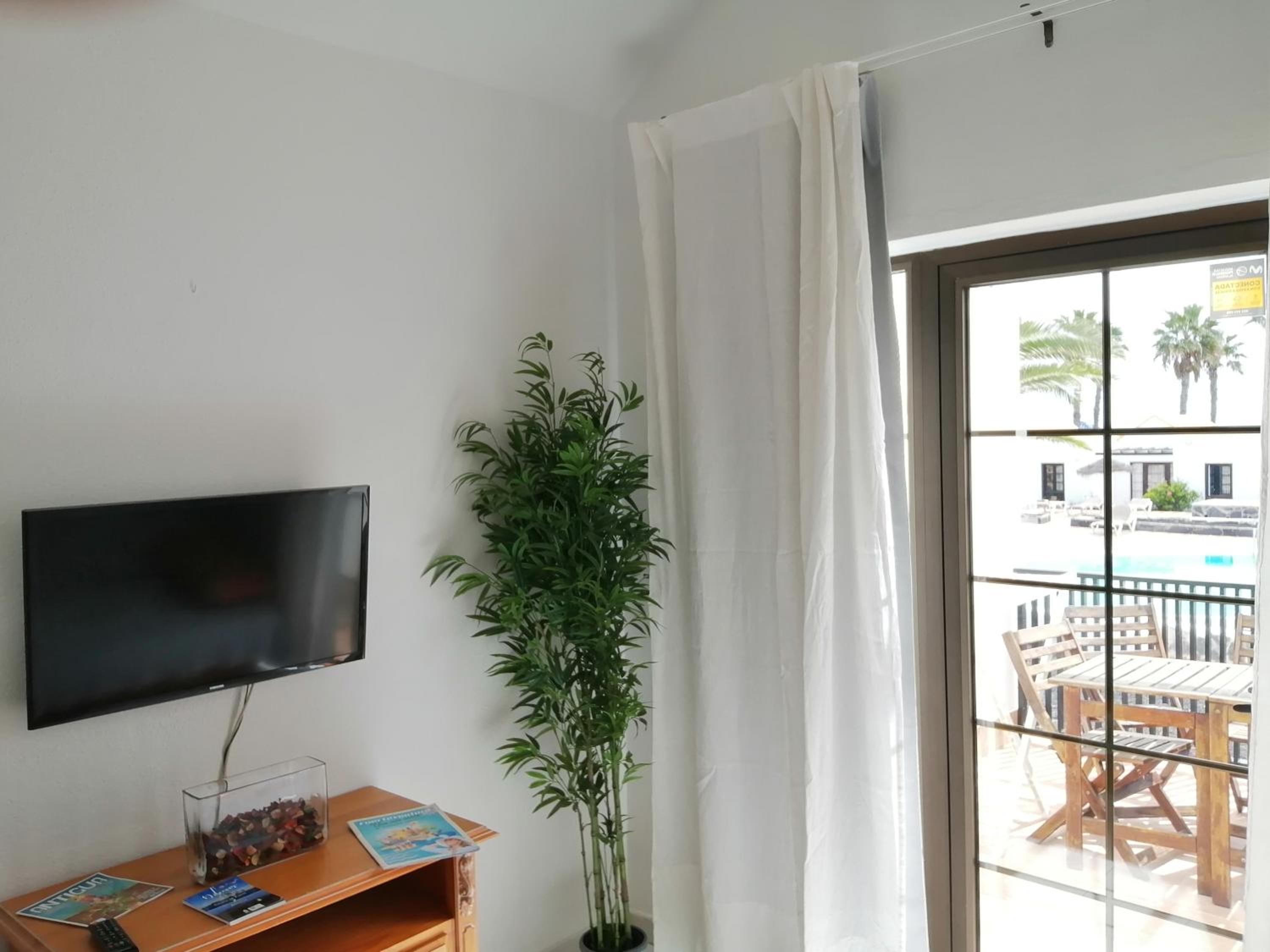 Apartamento con vista a la piscina