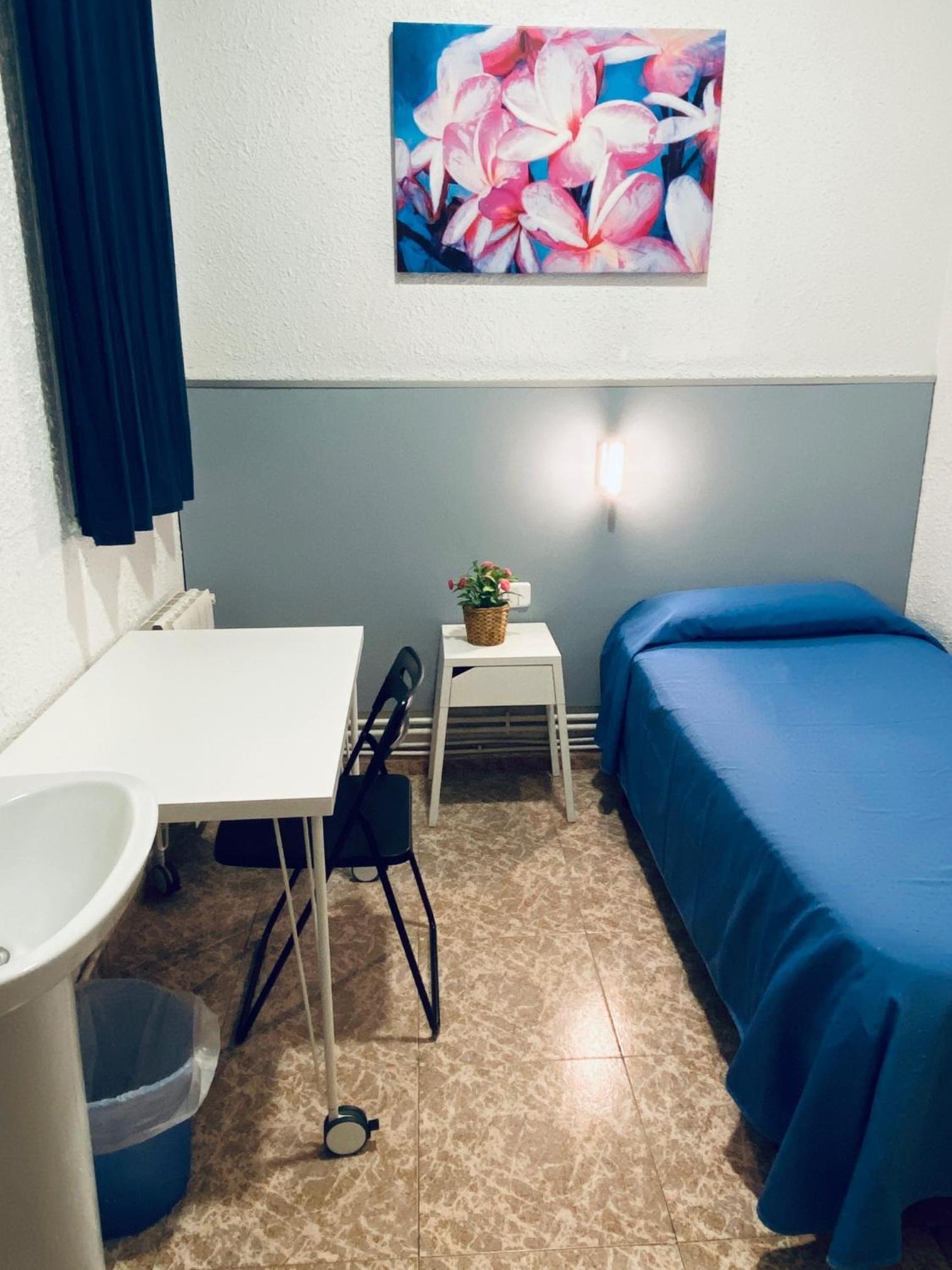 Habitación individual con baño compartido