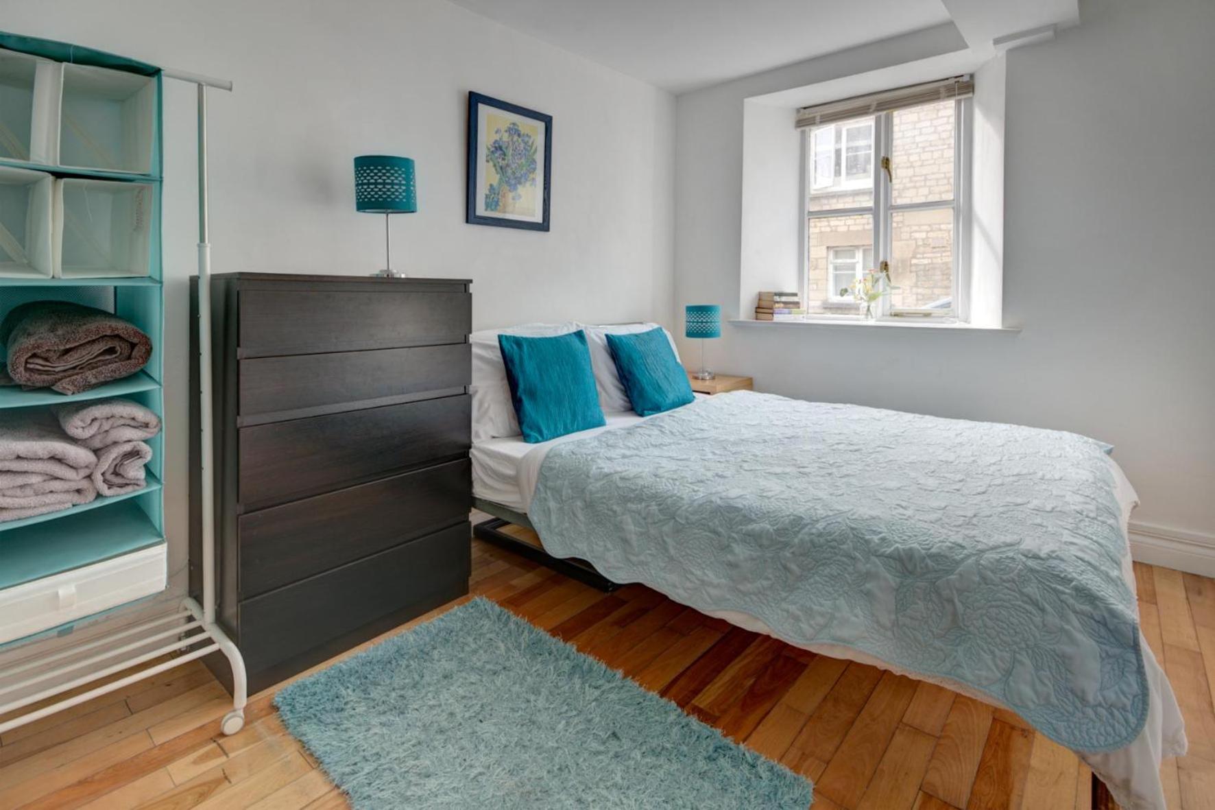 Three-Bedroom Apartment - Photo 24