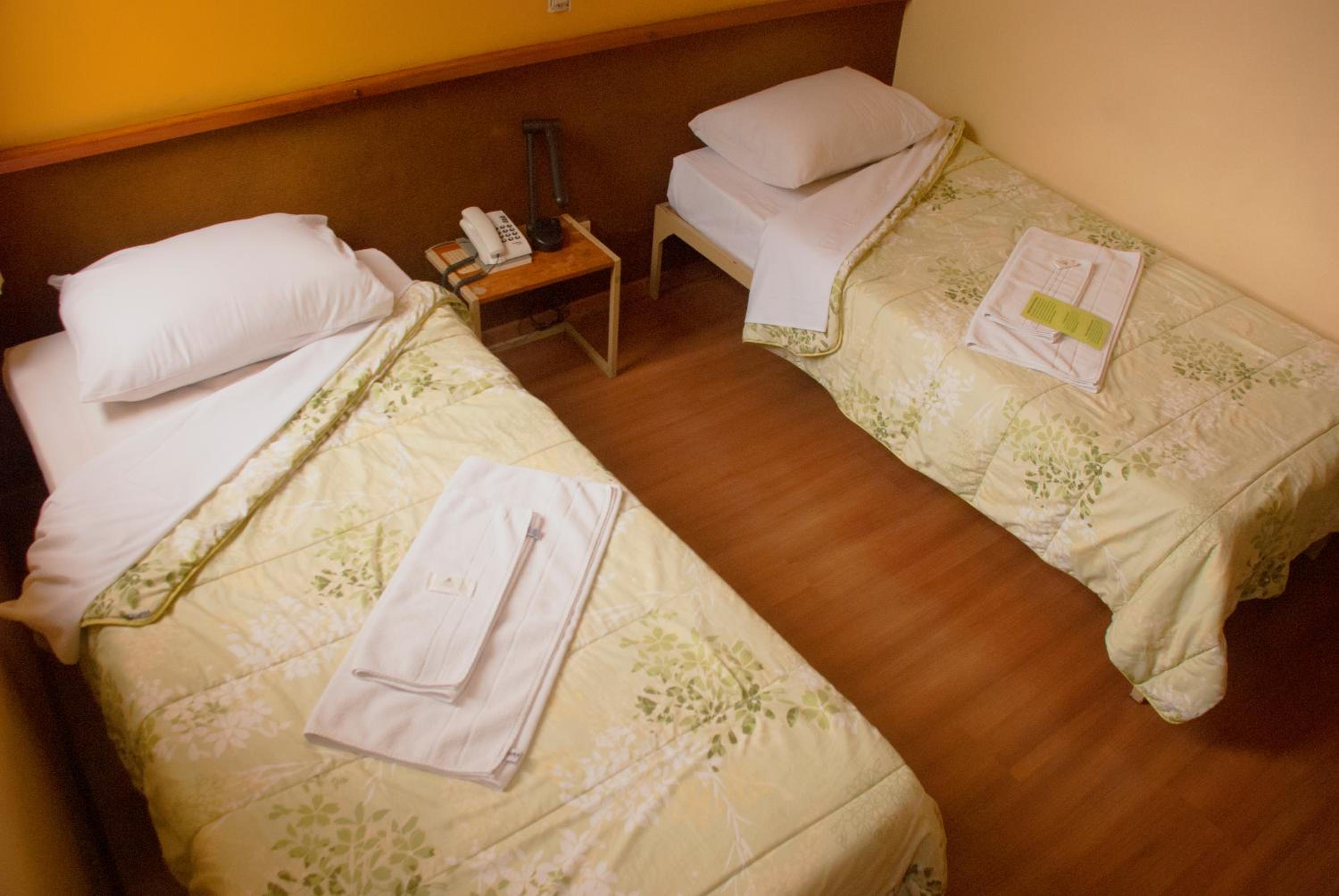 Hara Palace Hotel — Standard Double Room with Two Single Beds