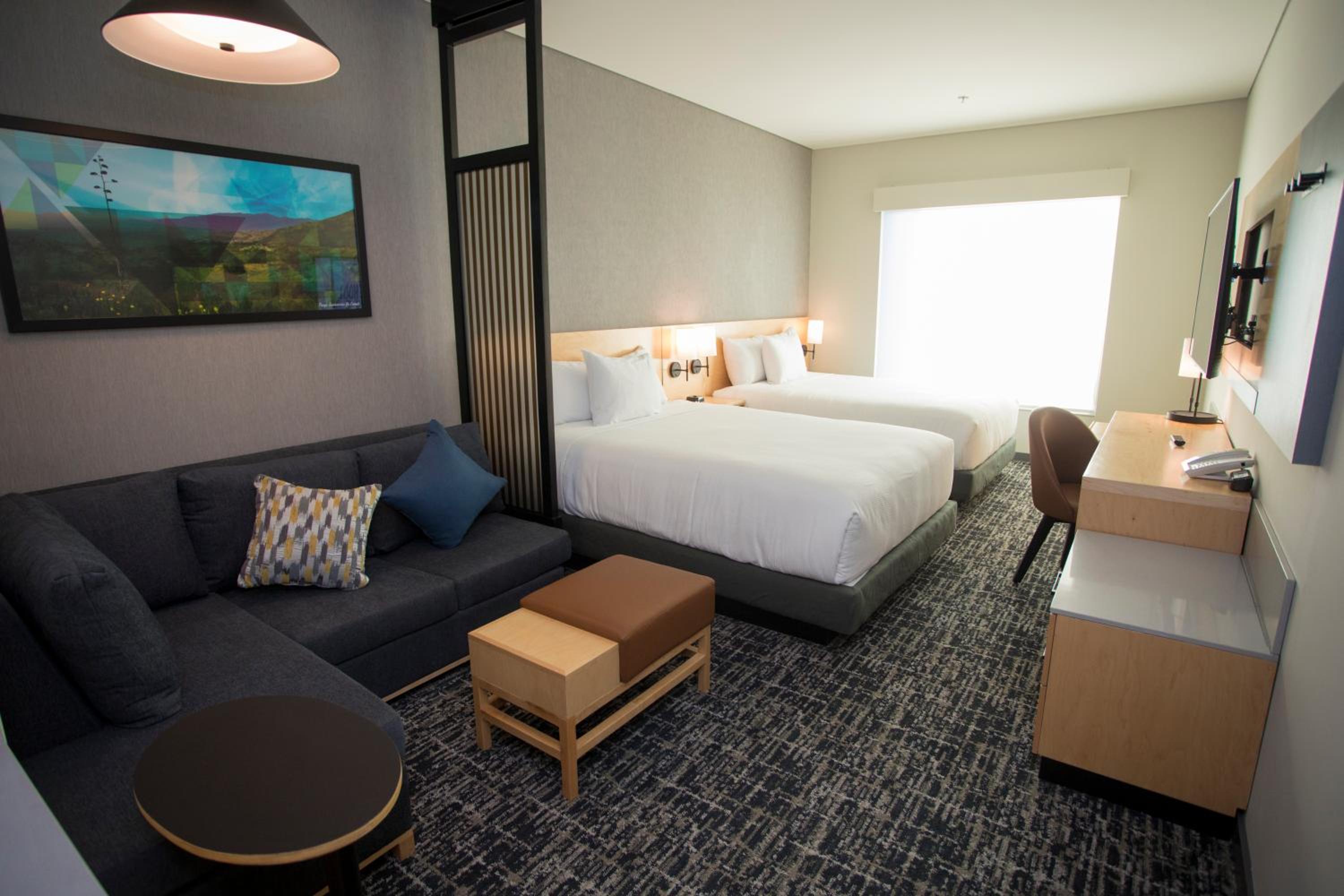 Queen Room with Two Queen Beds and Sofa Bed - Photo 1