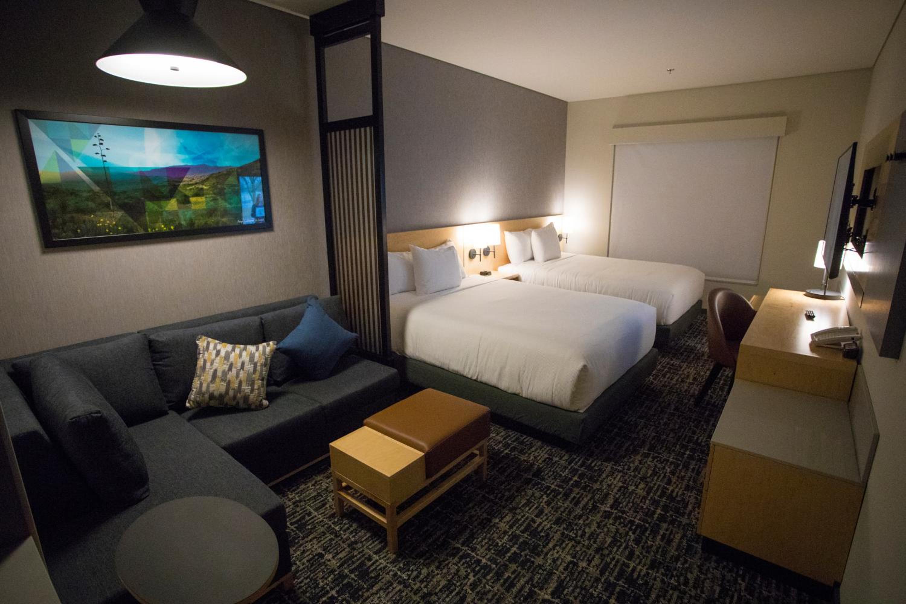 Queen Room with Two Queen Beds and Sofa Bed - Photo 6