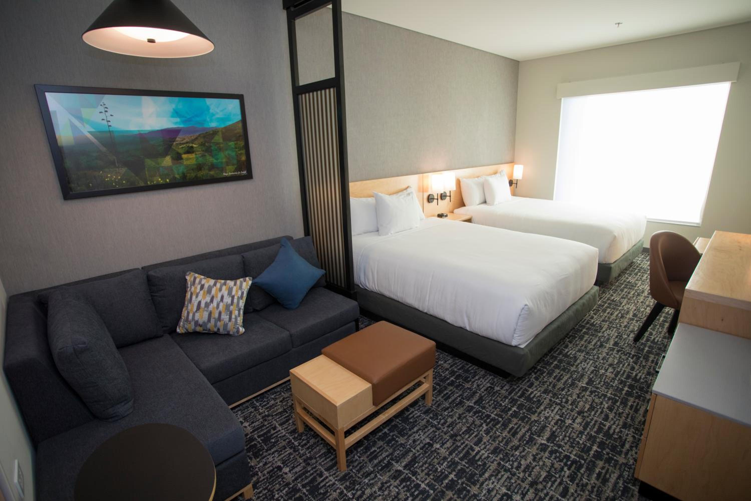 Queen Room with Two Queen Beds and Sofa Bed - Photo 5