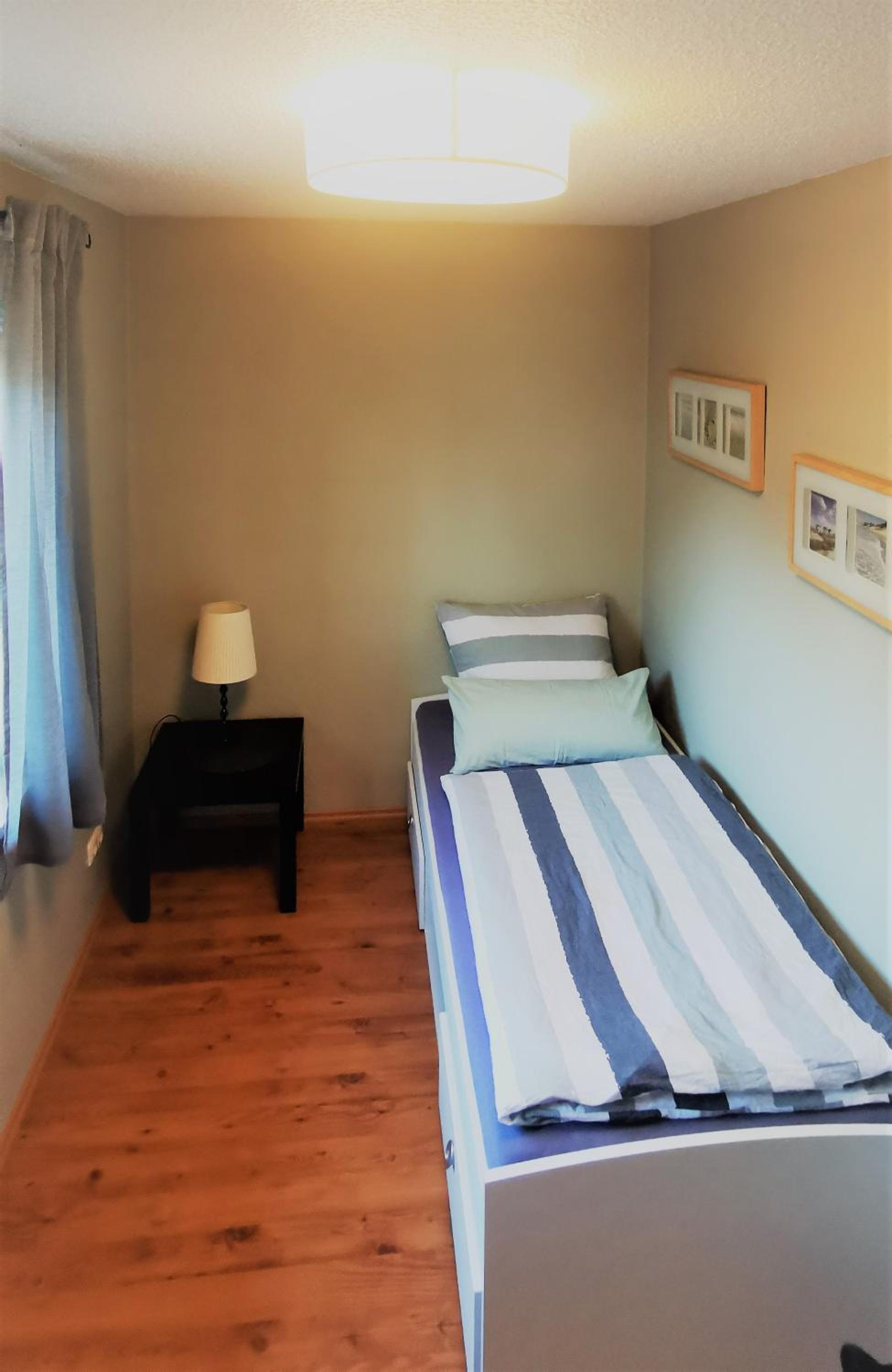 Three-Bedroom Apartment - Photo 21