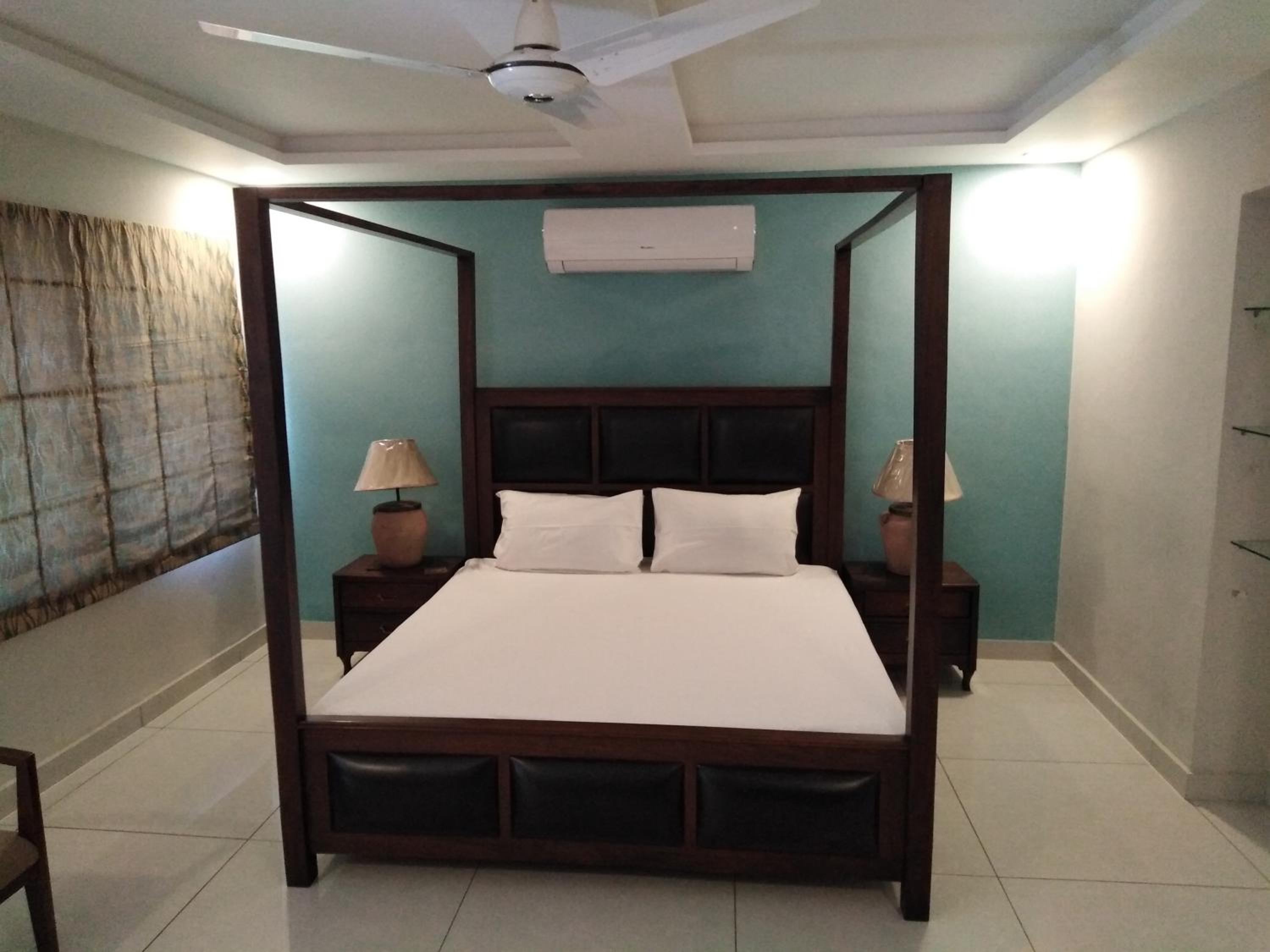 Deluxe Double Room (2 Adults + 1 Child) photo 2
