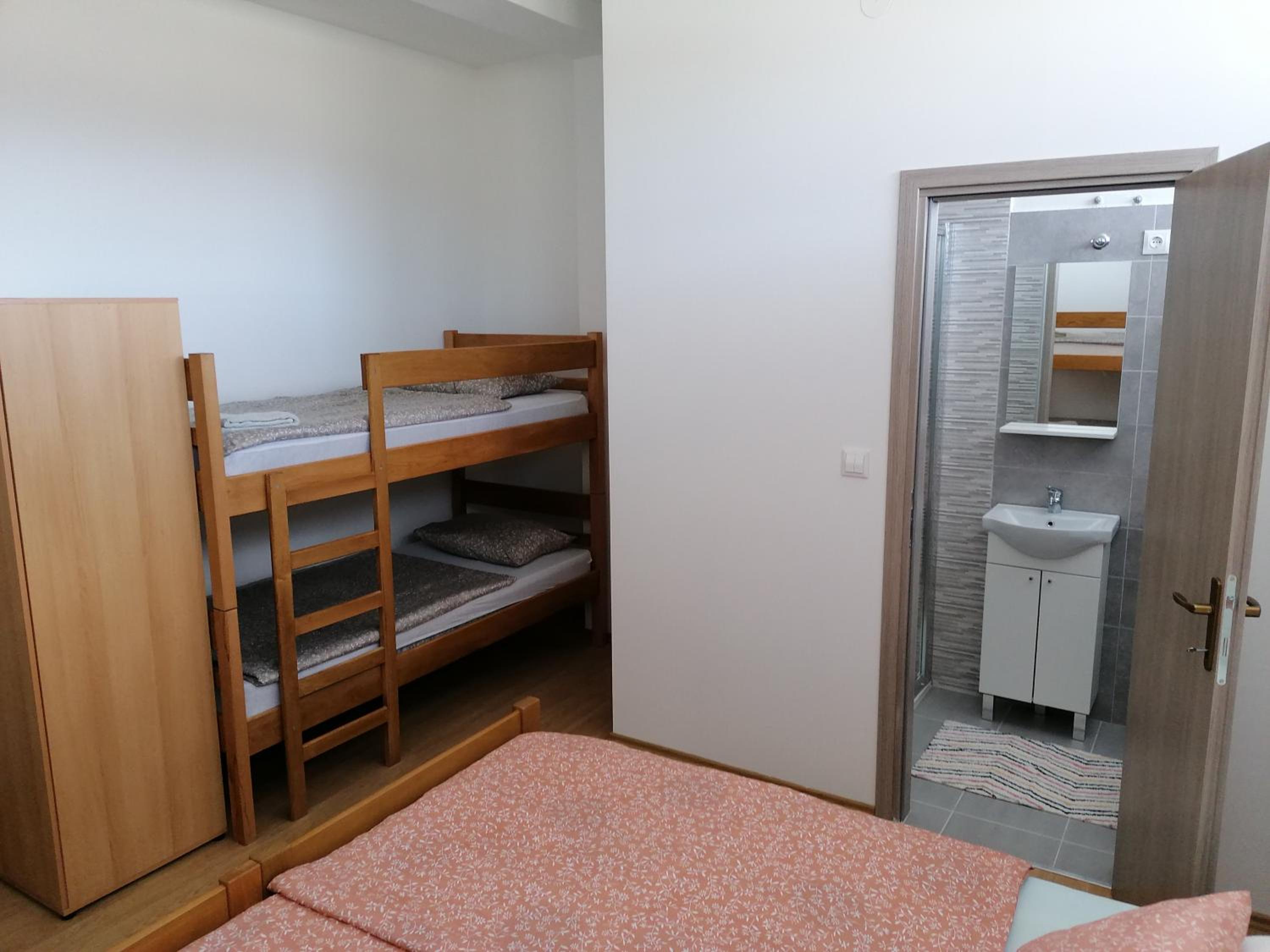 Deluxe Family Room with Private Bathroom - Photo 11