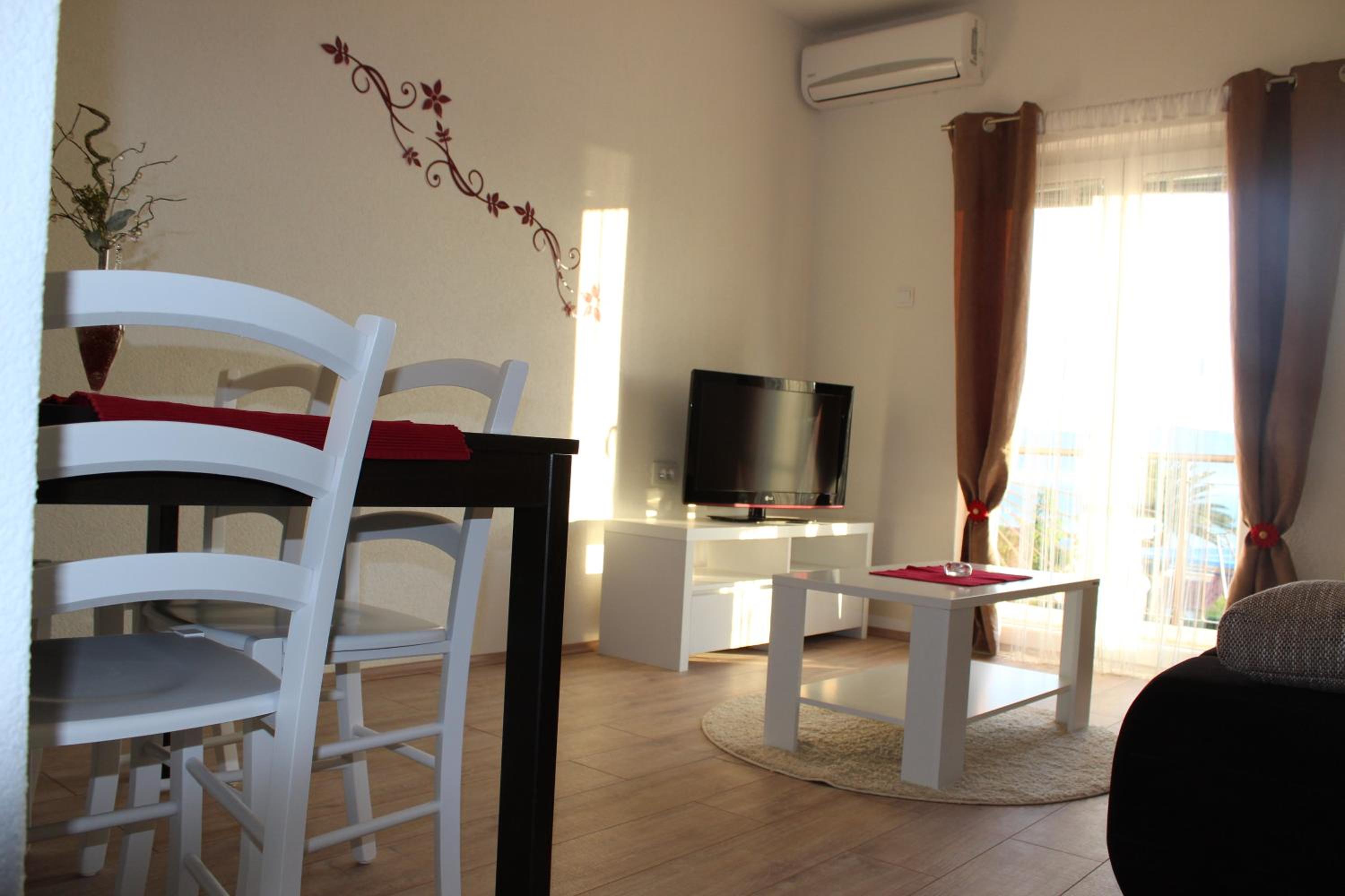 One-Bedroom Apartment with Balcony and Sea View