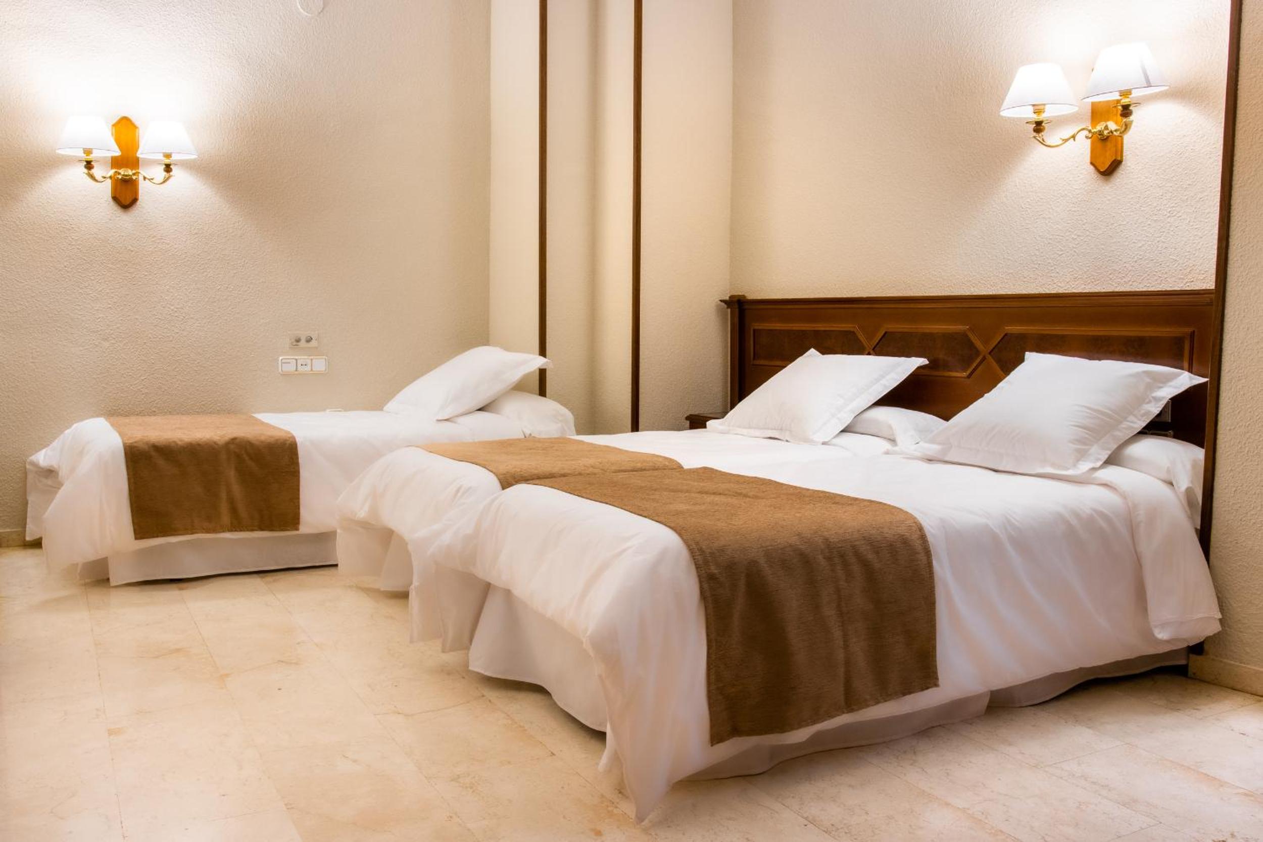 Triple Room - Photo 1