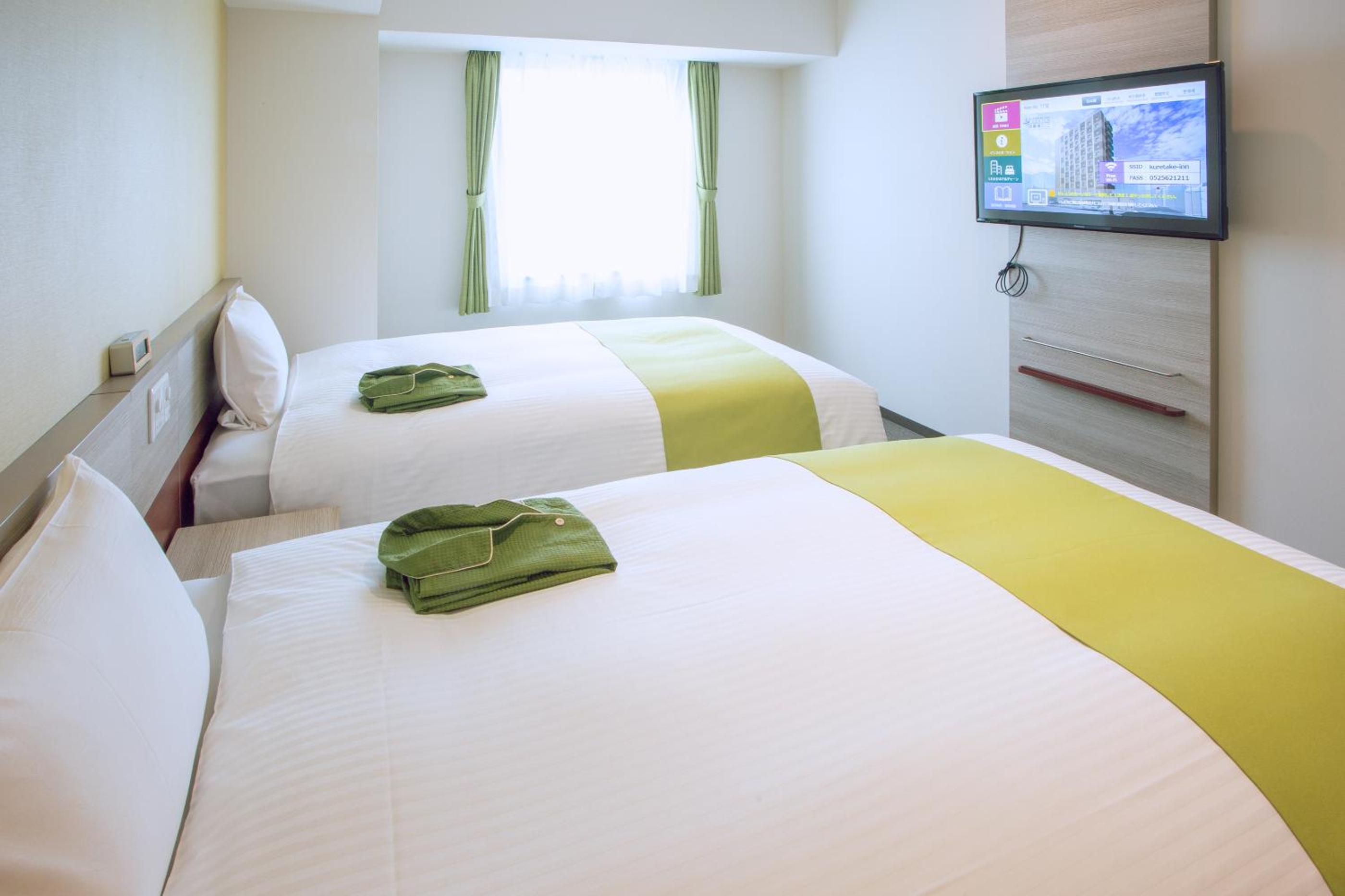 Twin Room - Non-Smoking - Photo 11