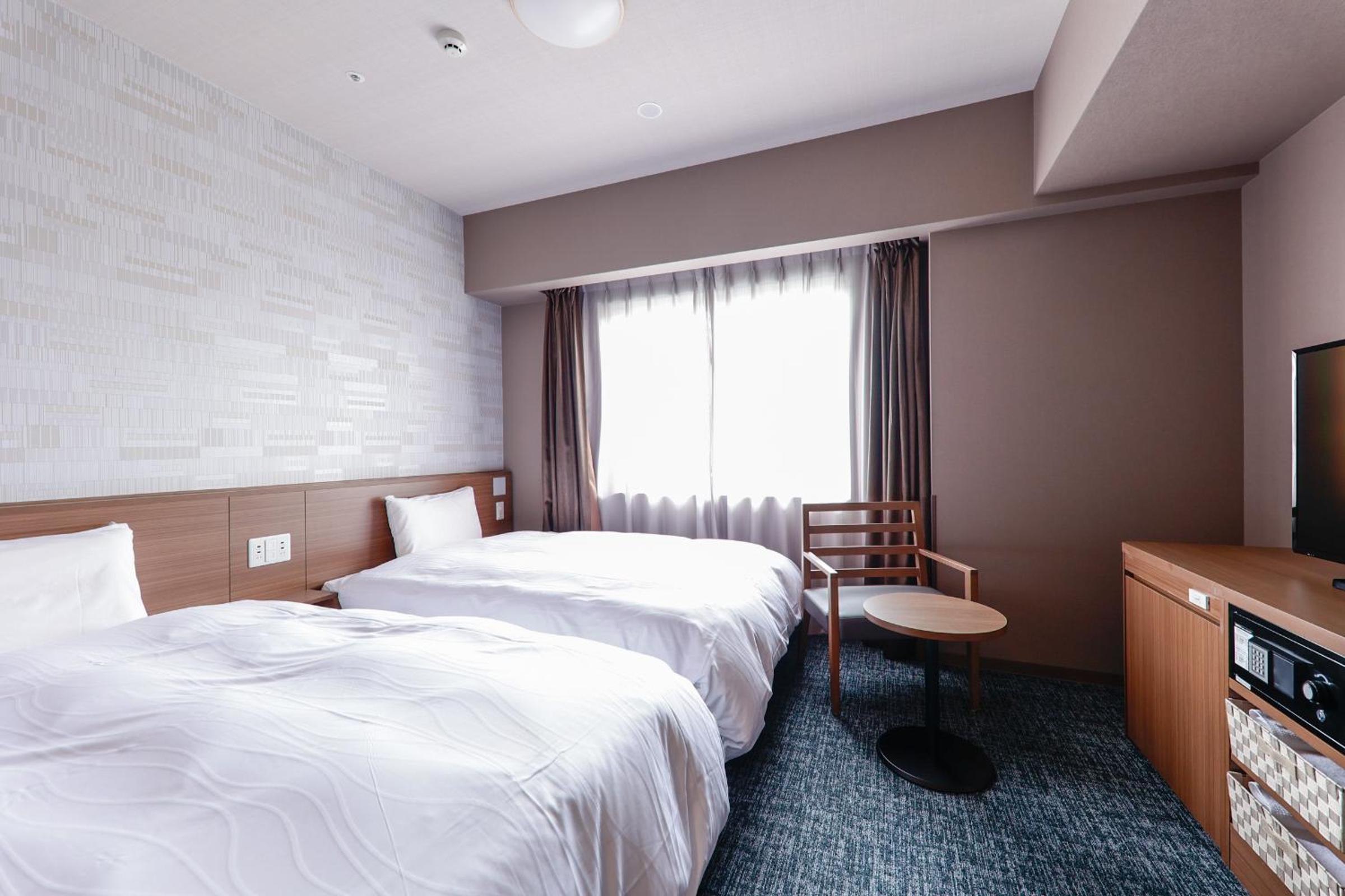 Standard Twin Room - Photo 4