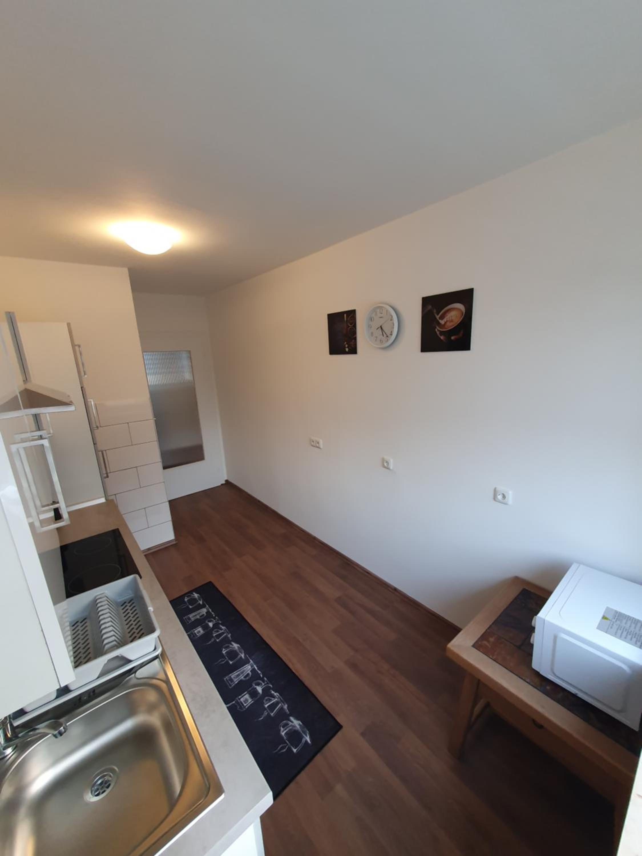 Three-Bedroom Apartment photo 2