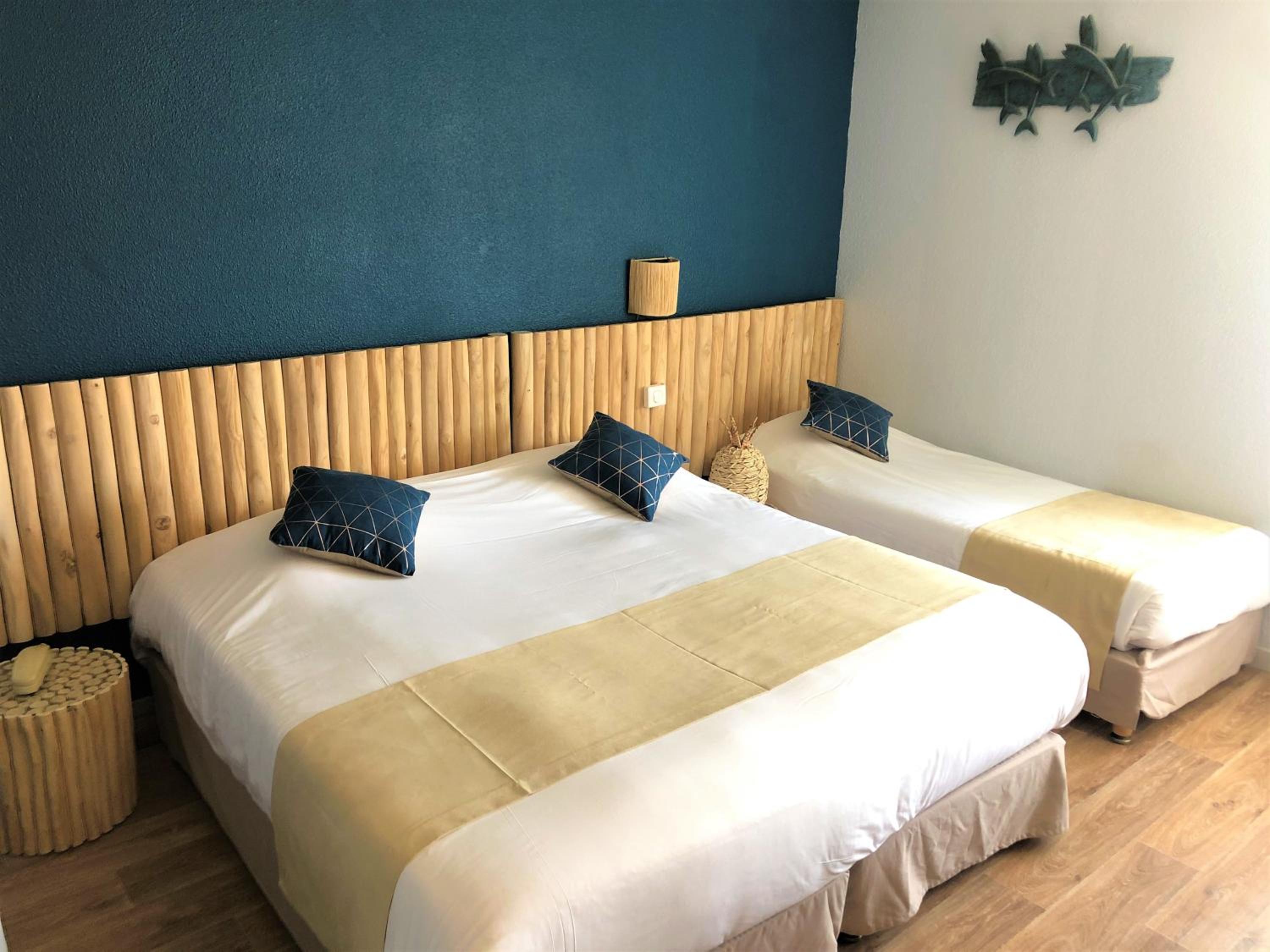 Triple Room (2 Adults + 1 Child)