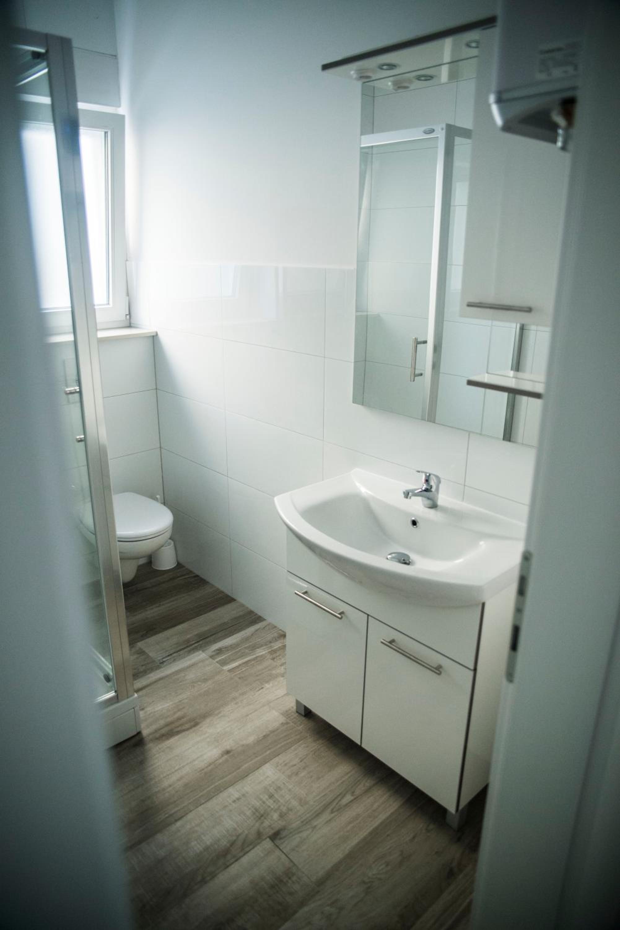 Apartment with Balcony - Photo 3