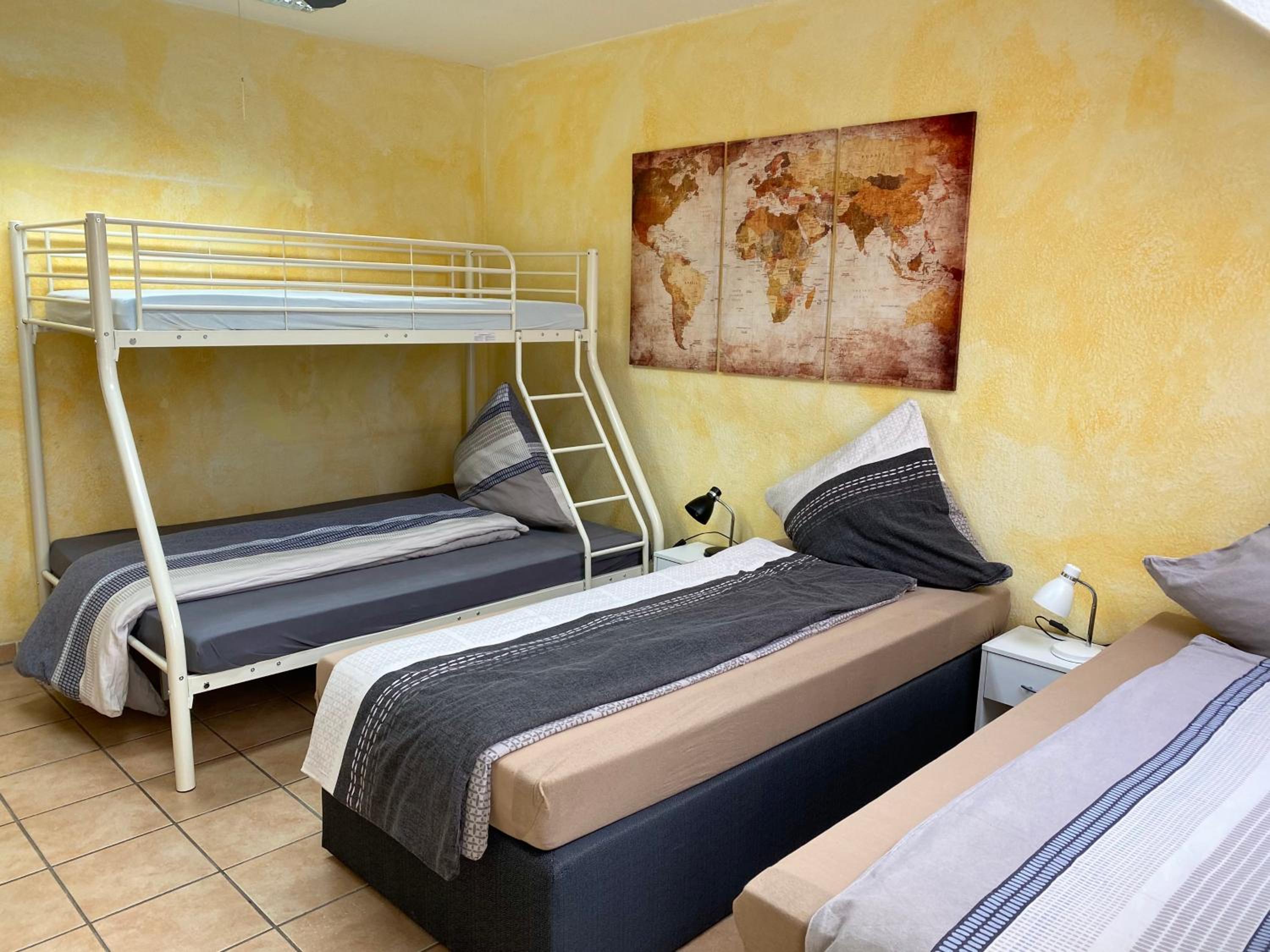 Three-Bedroom Apartment - Photo 9