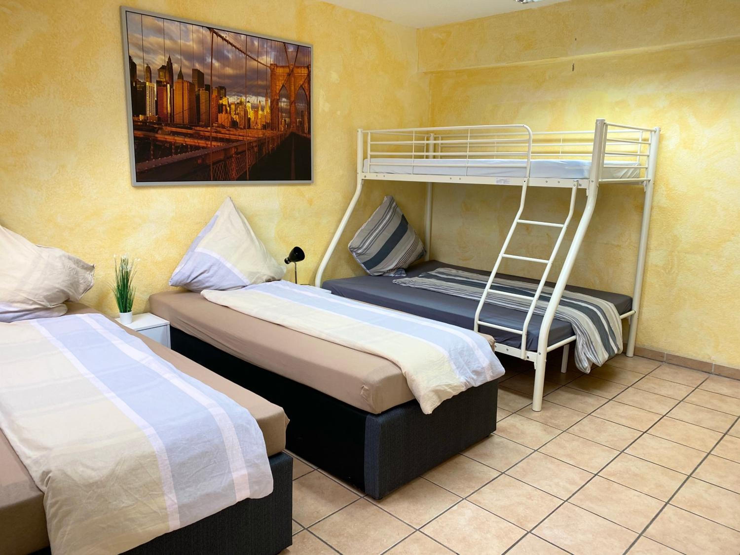 Three-Bedroom Apartment - Photo 6