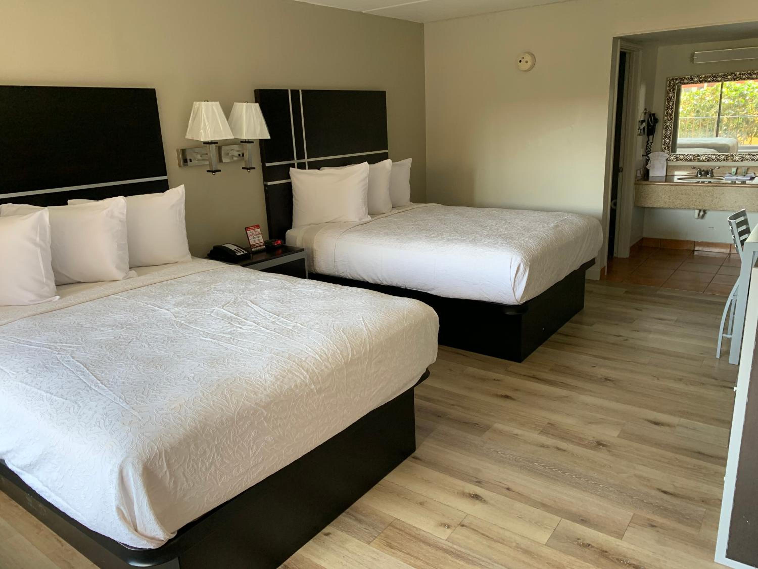 Queen Room with Two Queen Beds - Photo 1