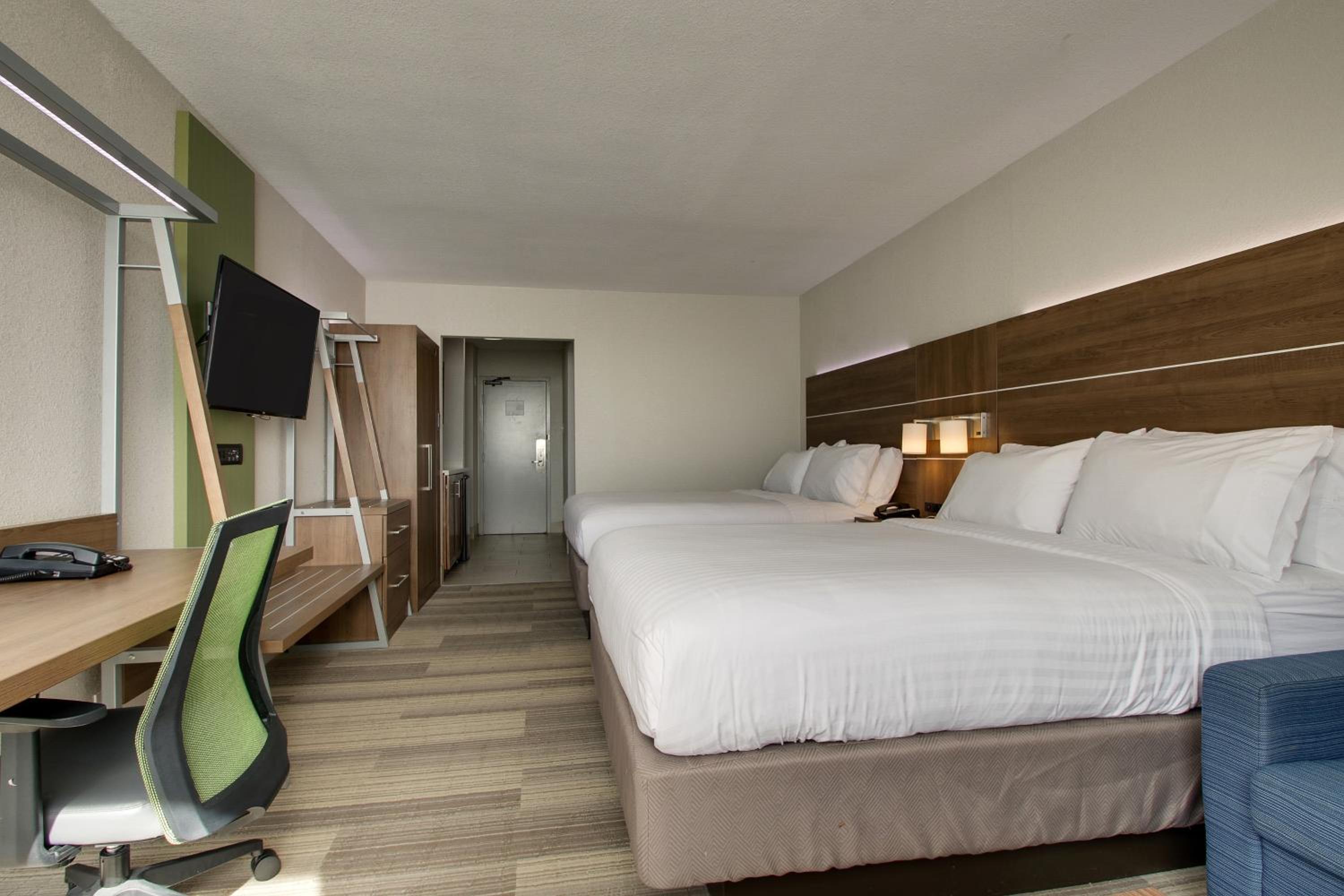 Queen Suite with Two Queen Beds and Sofa Bed - Photo 1