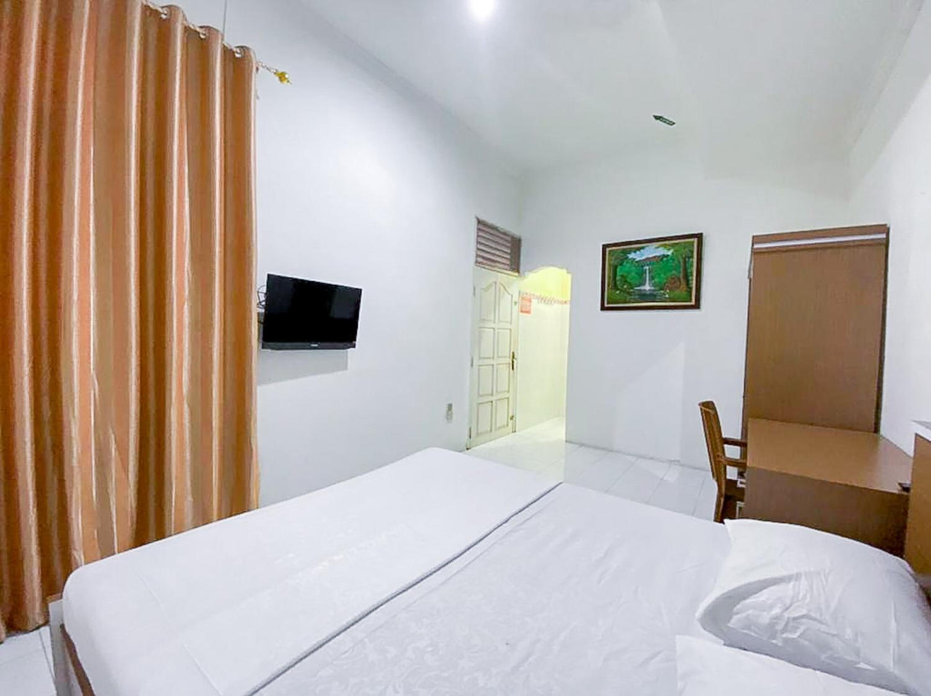 Deluxe Room - Photo 3
