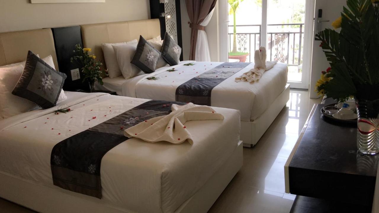 Deluxe Triple Room - Photo 13