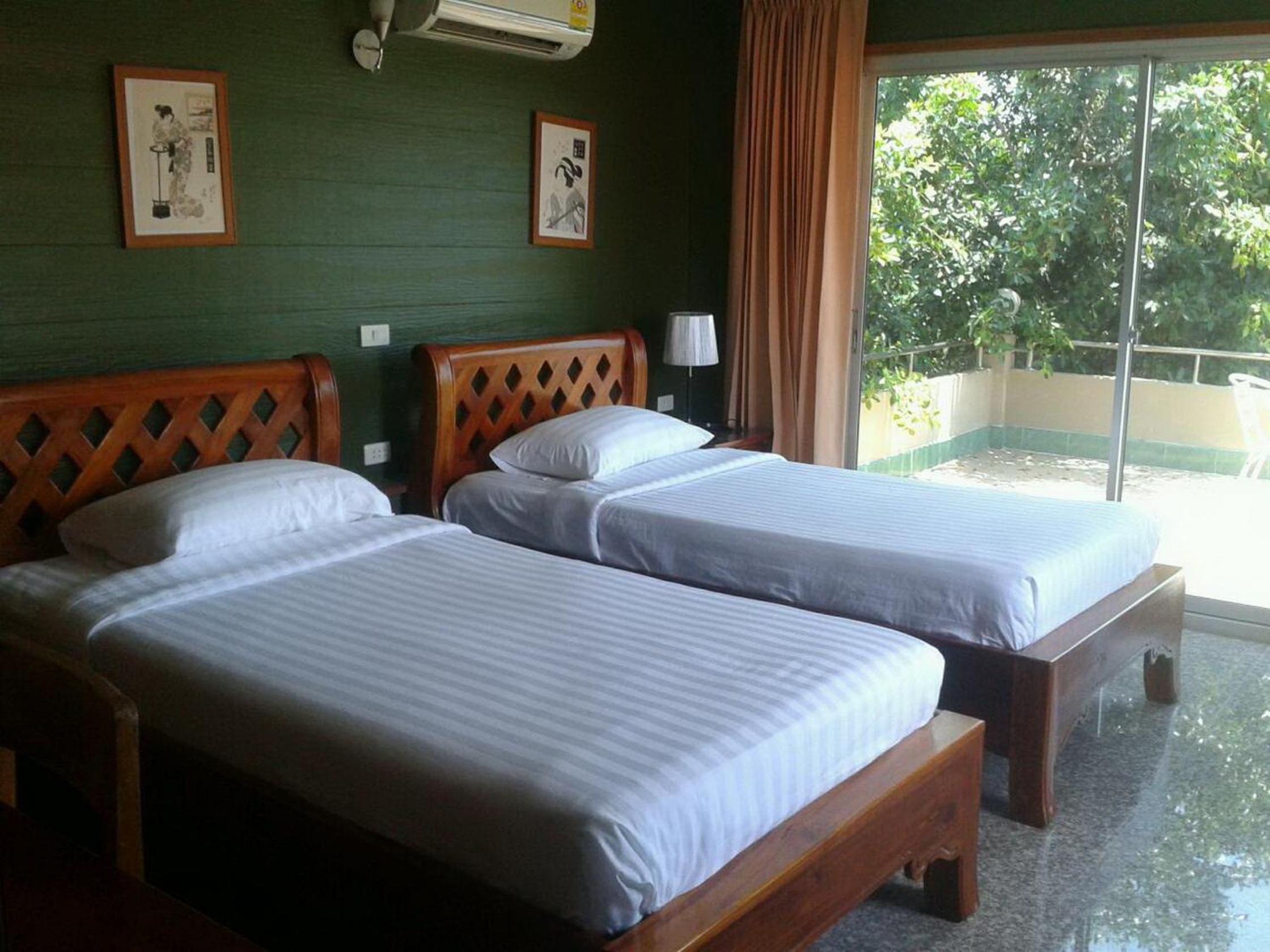 Quadruple Room Beach Front photo 3