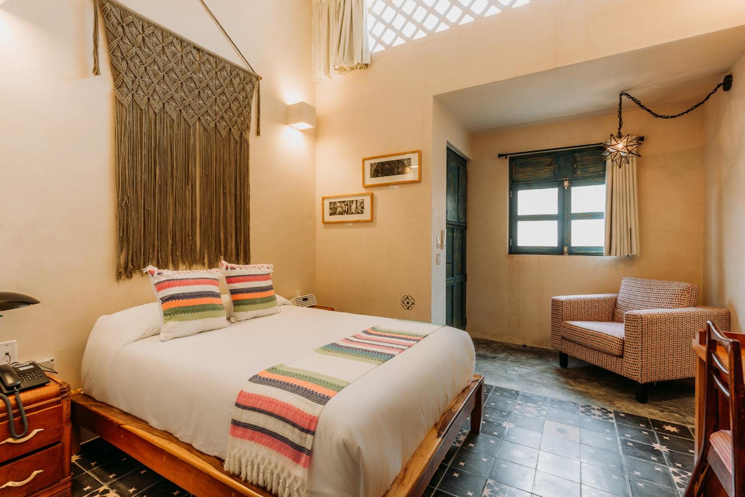 Deluxe Room with Balcony, Air Conditioning and Private Bathroom