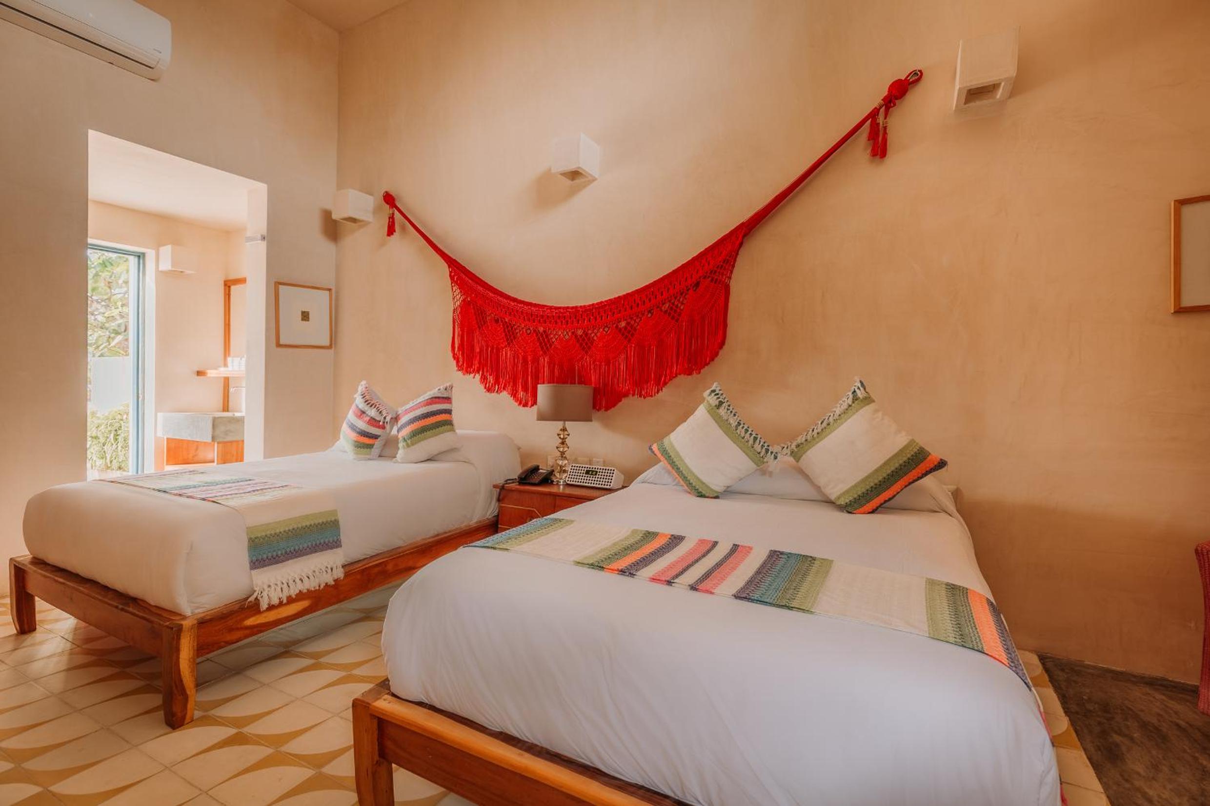 Deluxe Family Room with Balcony, Air Conditioning and Private Bathroom