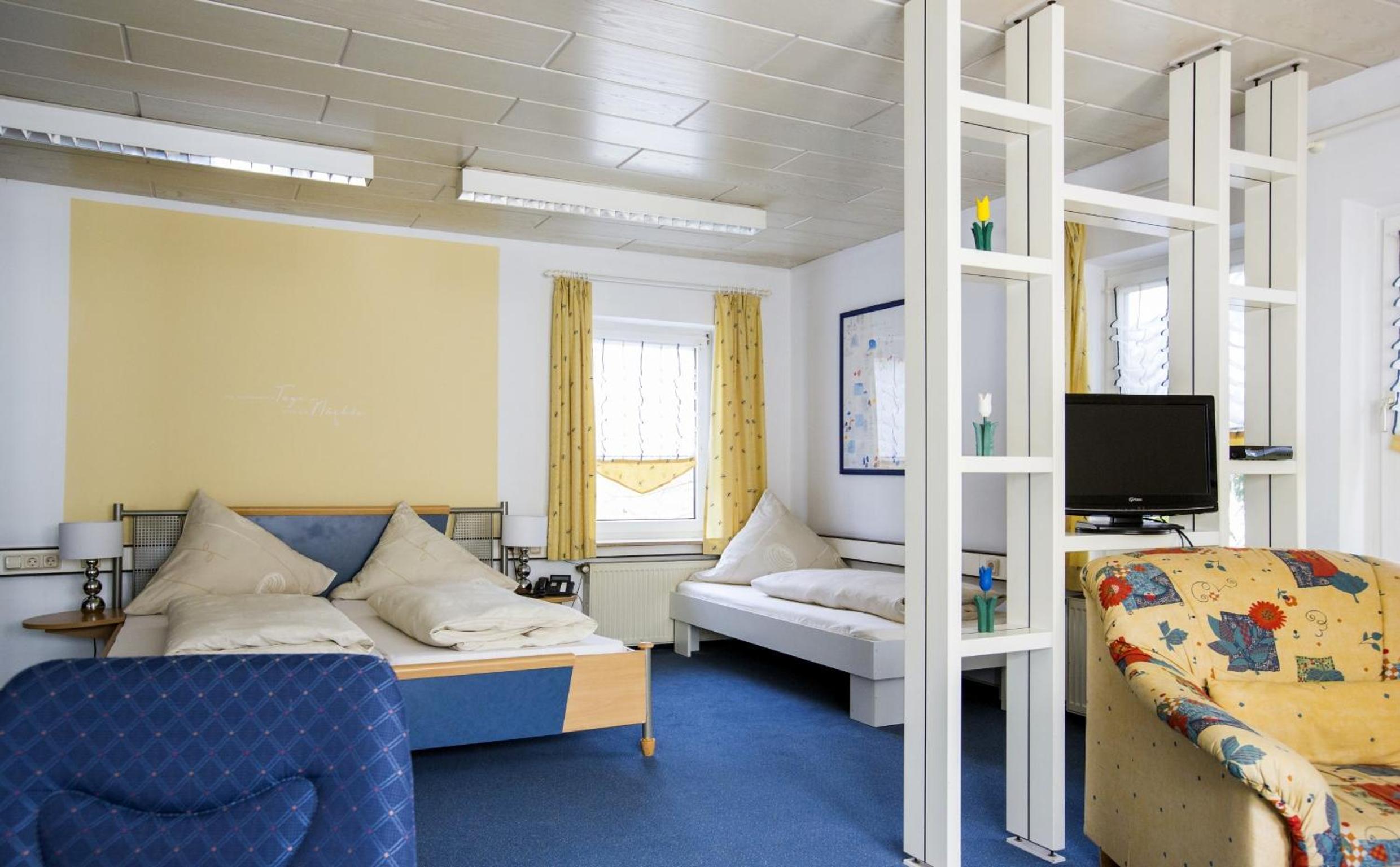 Quadruple Room - Photo 8