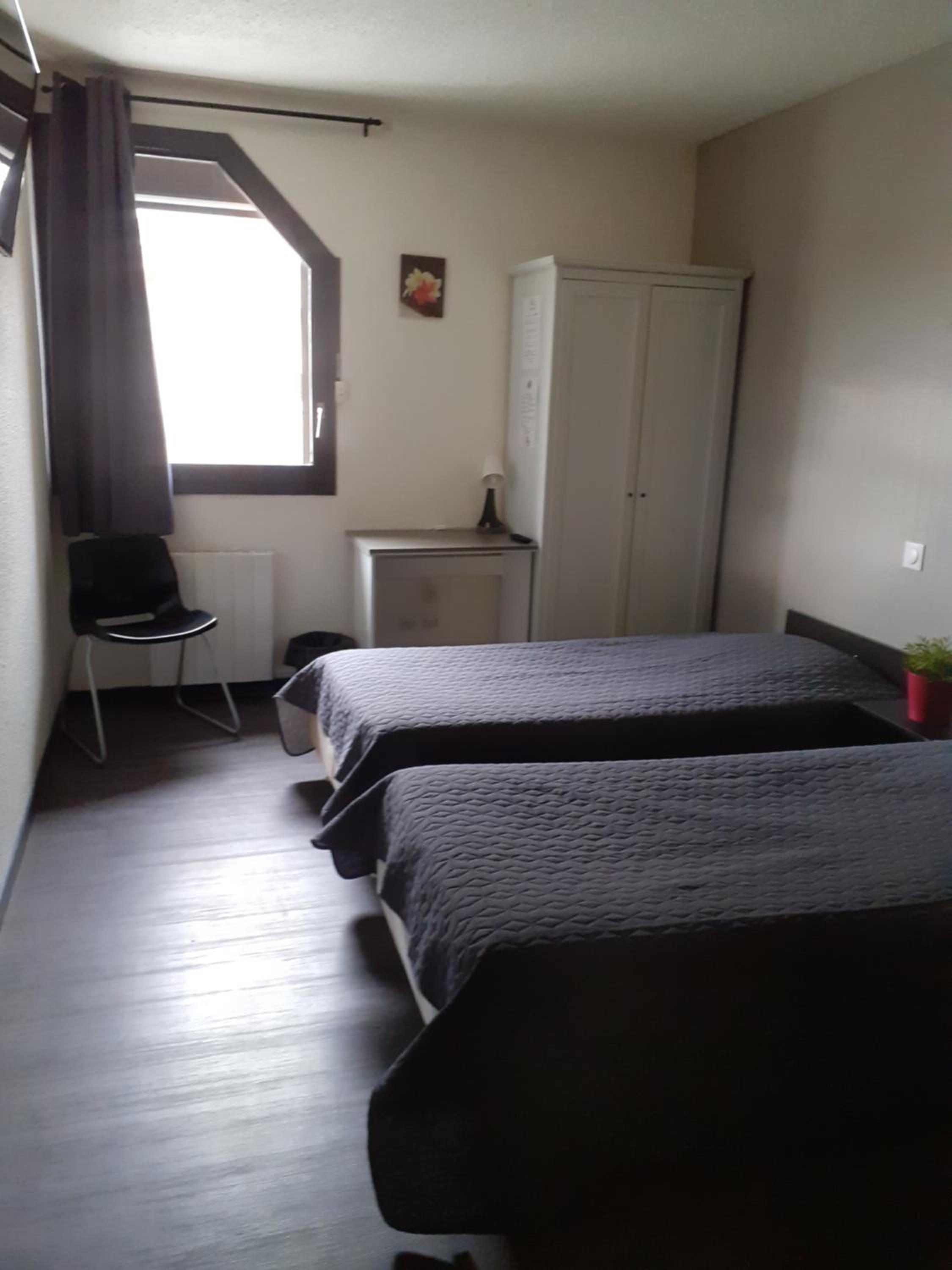 Twin Room - Photo 1