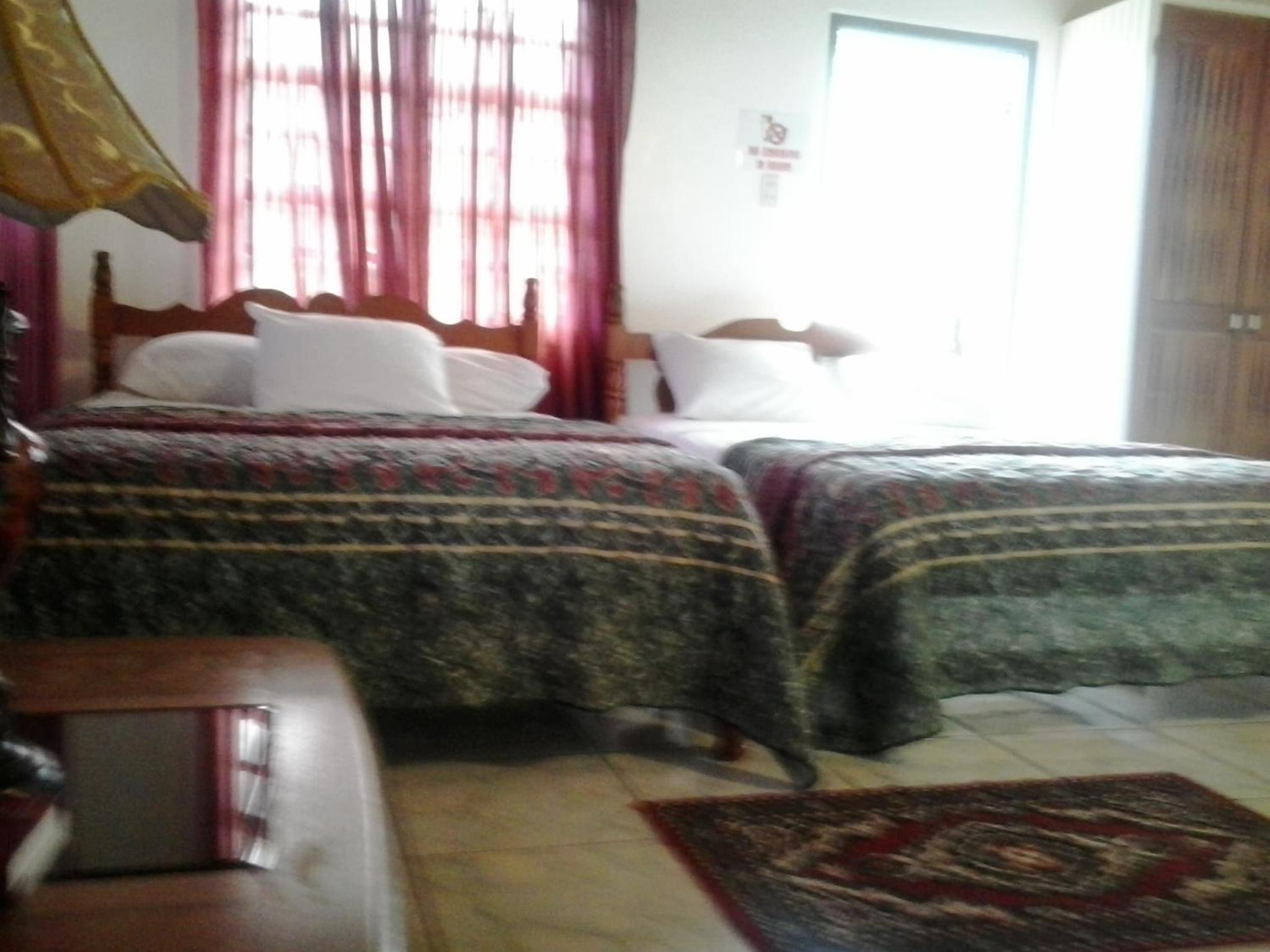 Studio with Two Double Beds with Partial Sea View photo 2