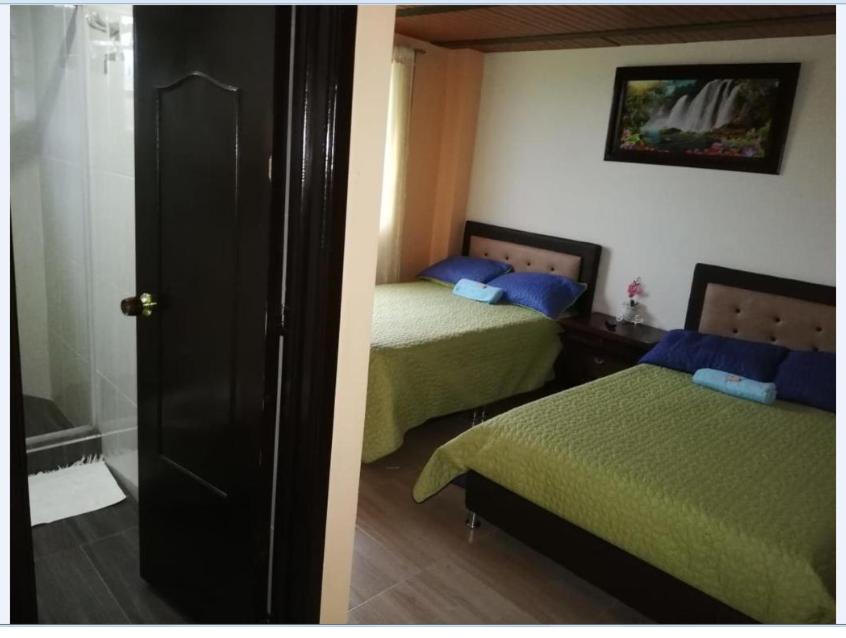 Quadruple Room with Private Bathroom photo 2