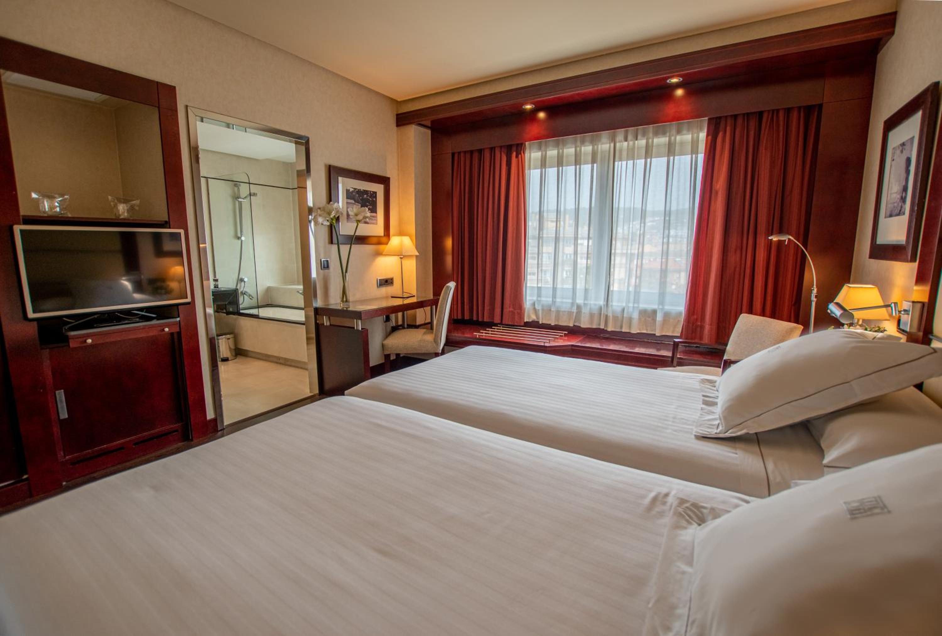 Relax in this stylishly designed hotel room.