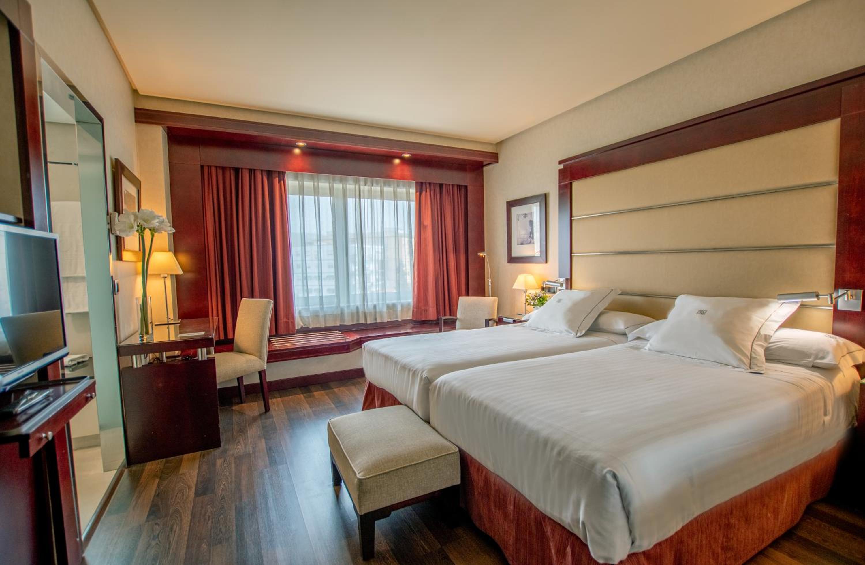 Relax in comfort with our cozy hotel room.
