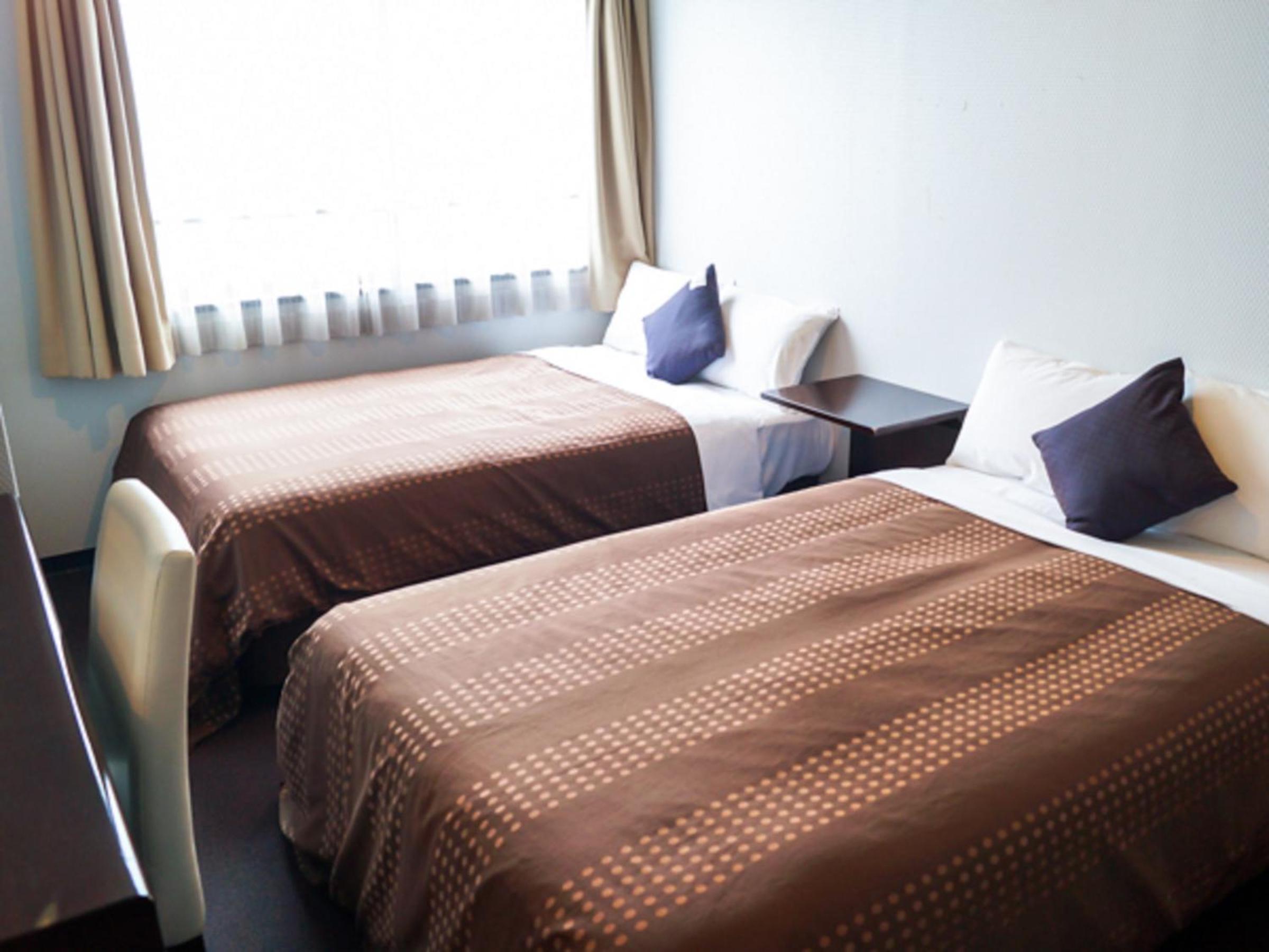 Twin Room with Private Bathroom