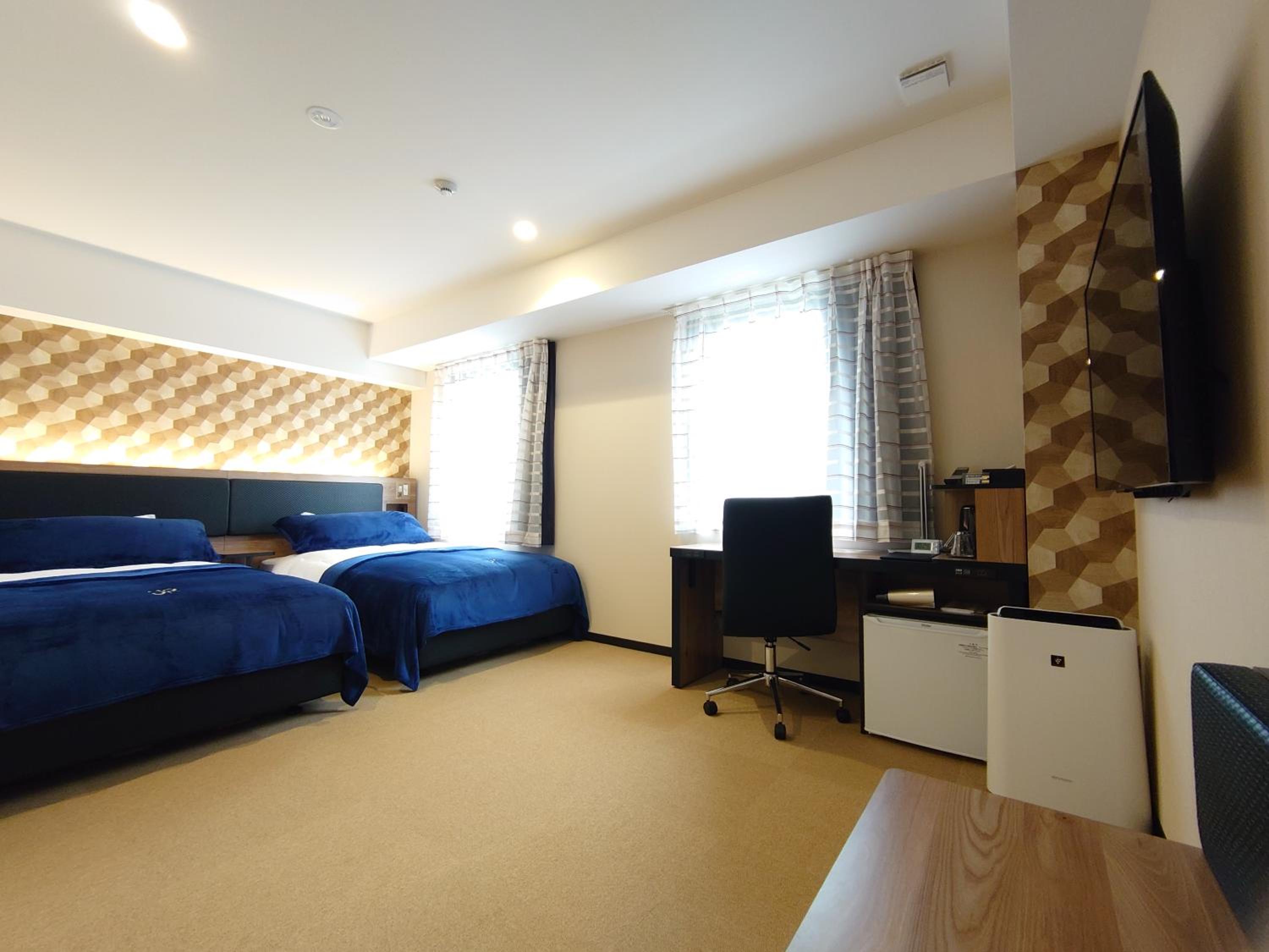 Universal Twin Room - Non-Smoking - Photo 1