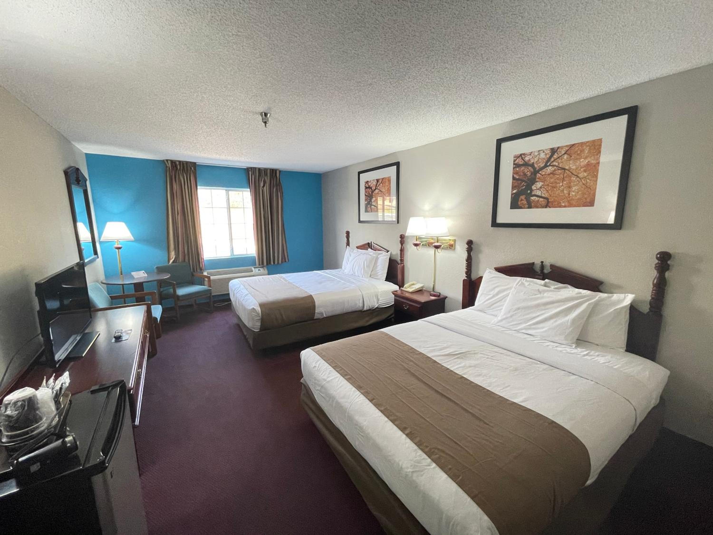 Queen Room with Two Queen Beds - Photo 1