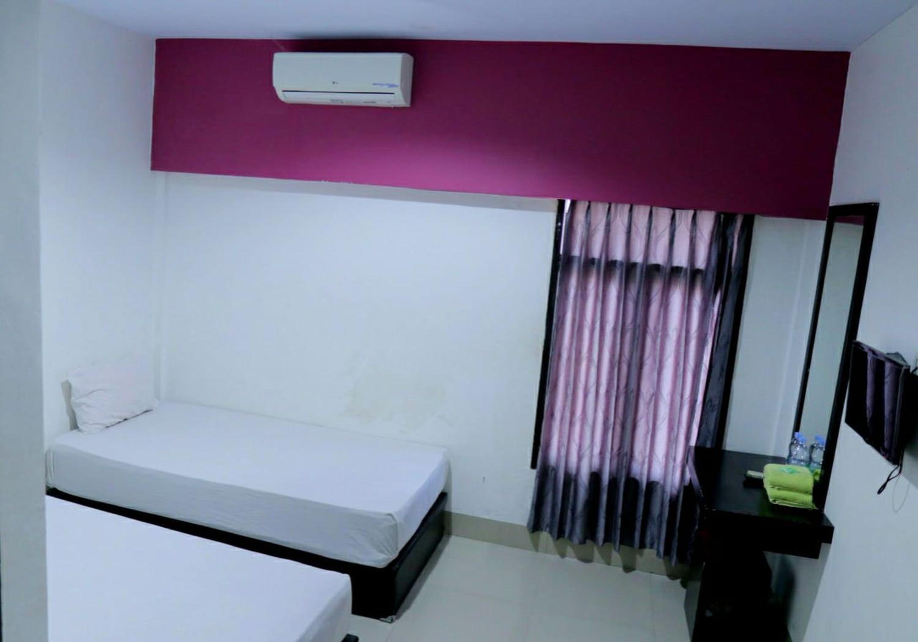 Twin Room - Photo 8