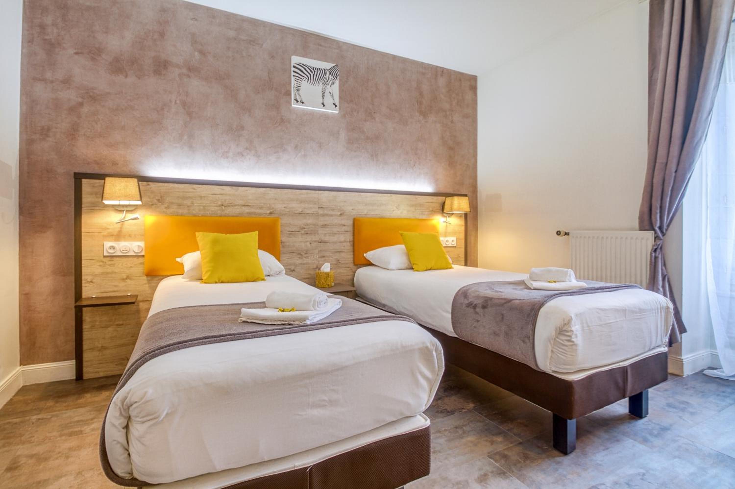 Twin Room - Photo 1