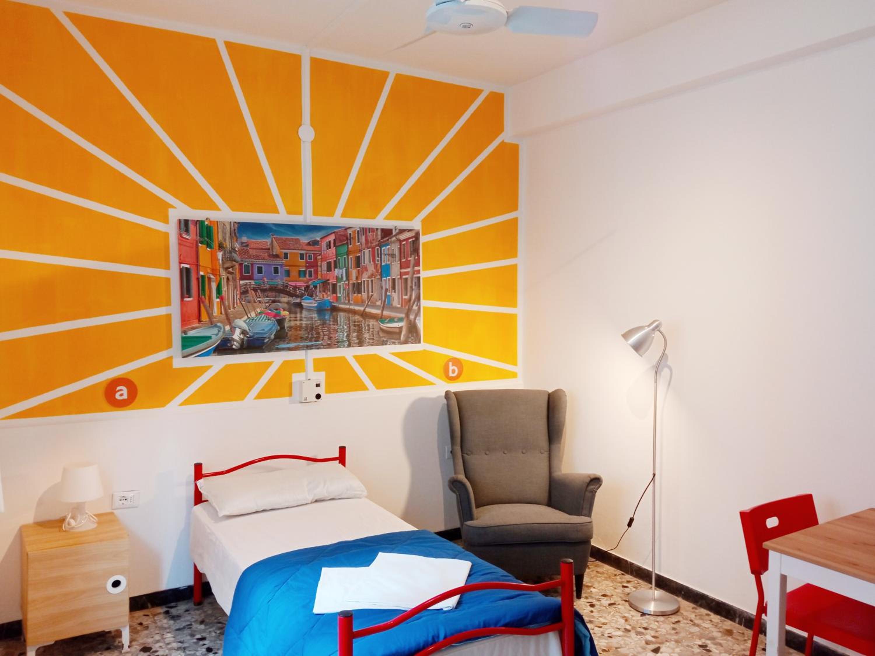 Camera Singola con bagno condiviso