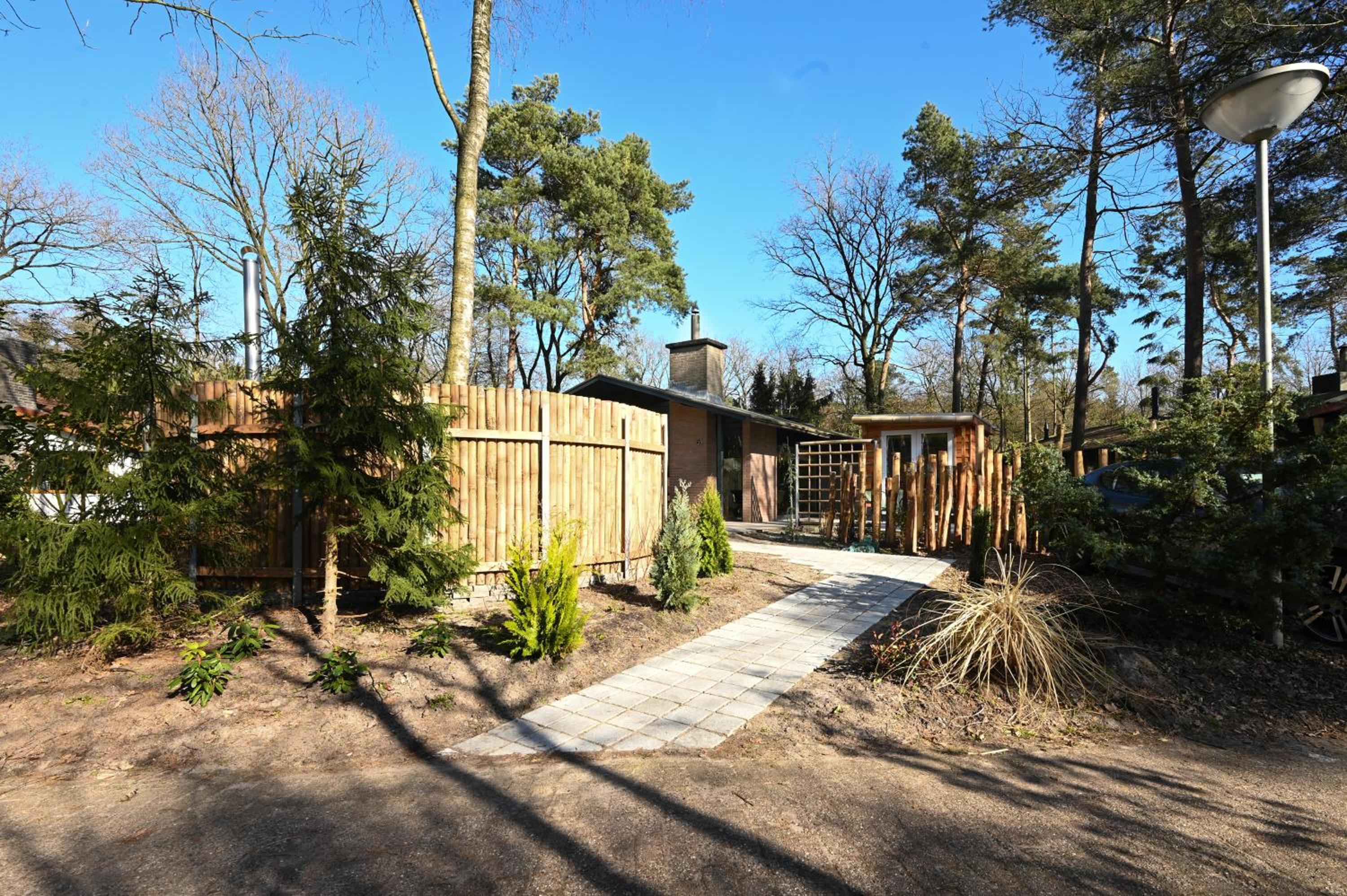 Three-Bedroom House - Photo 32