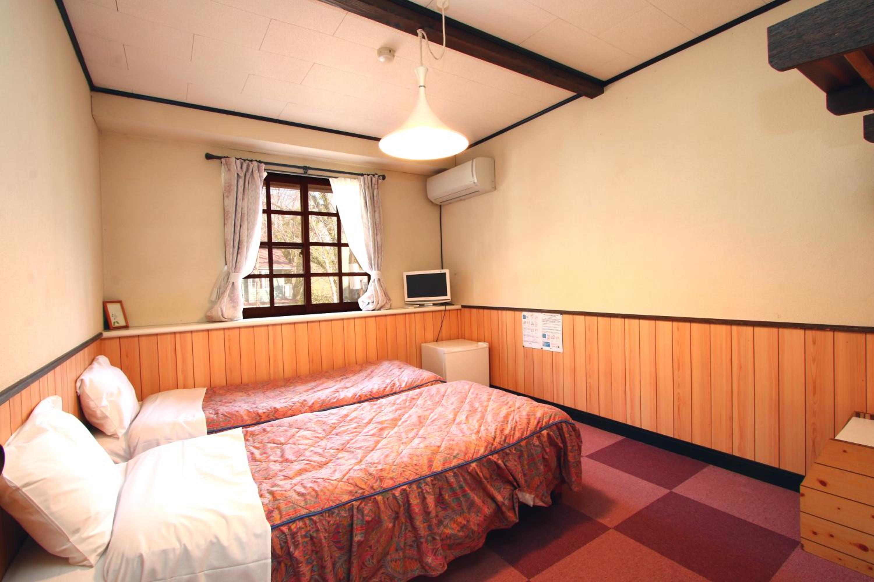 Twin Room - Photo 1