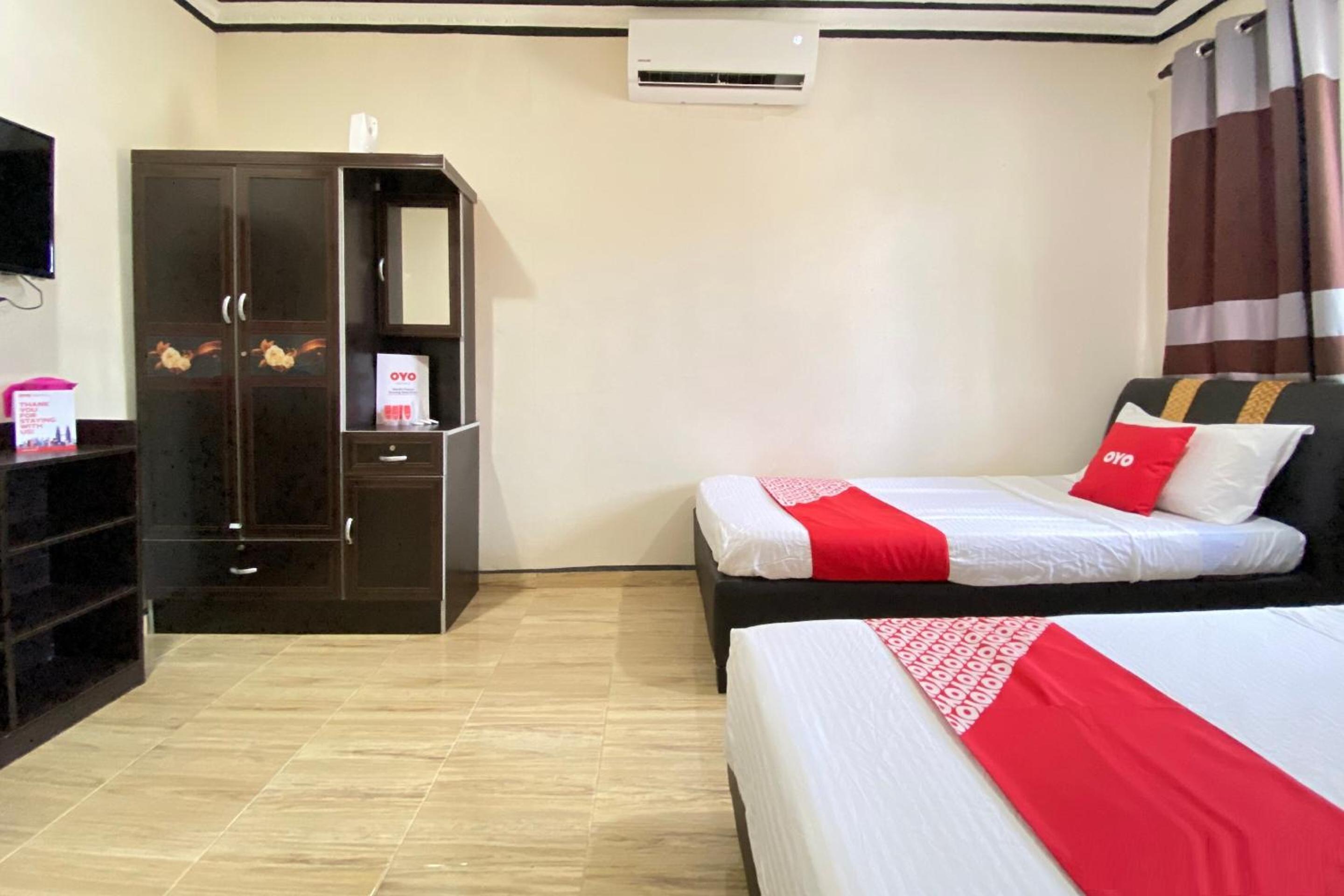 Deluxe Triple Room - Photo 9